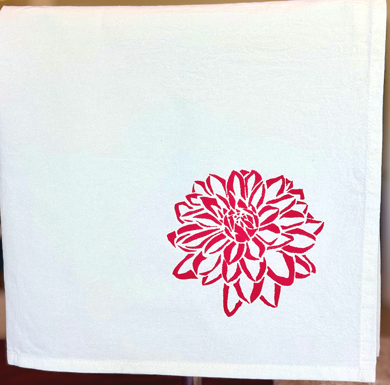 Image of cotton tea towel with original Dahlia bloom screen printed design from Handforth Botanical Studio