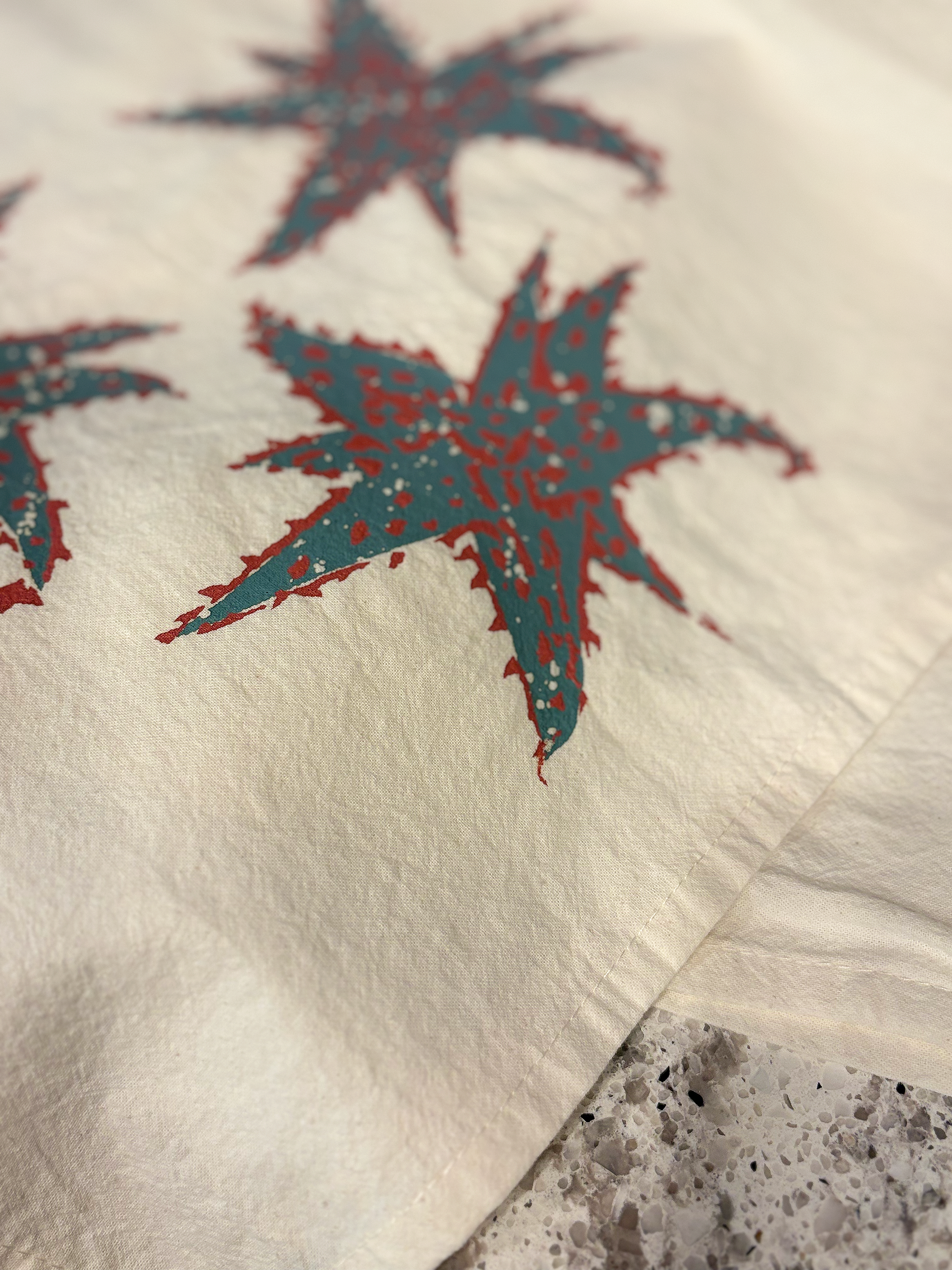 Image of cotton tea towel with original Aloe hybrid screen printed design from Handforth Botanical Studio