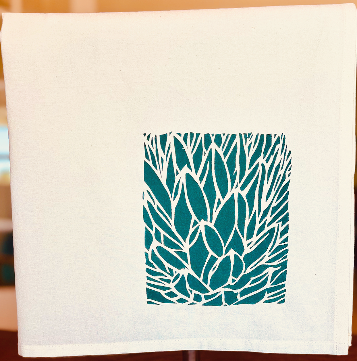 Image of cotton tea towel with original Agave victoriae-reginae screen printed design from Handforth Botanical Studio