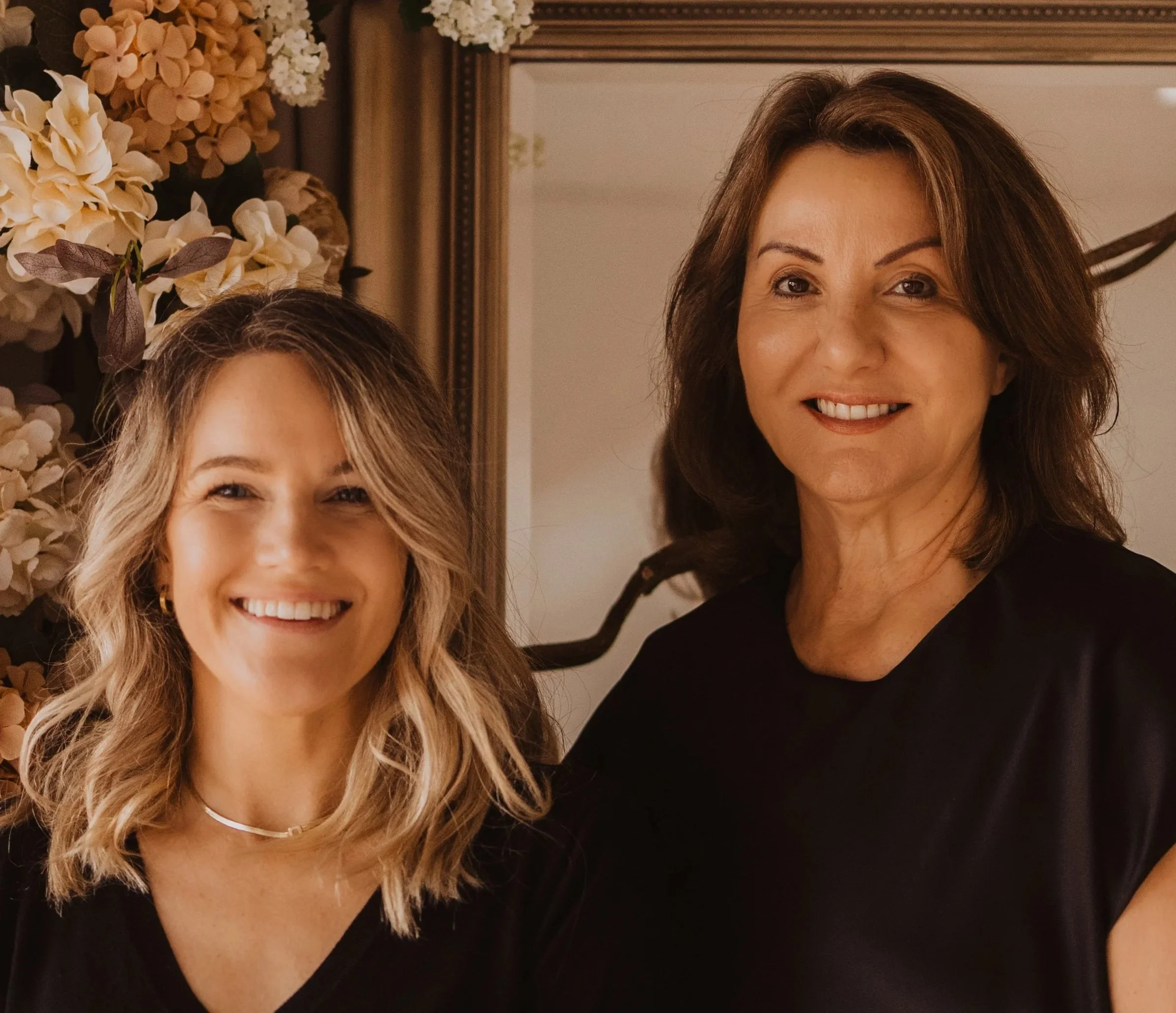 Connie Di Genni and Alison Amy standing in the beautiful Accapella Bridal Wedding Dress Shop in Wollongong