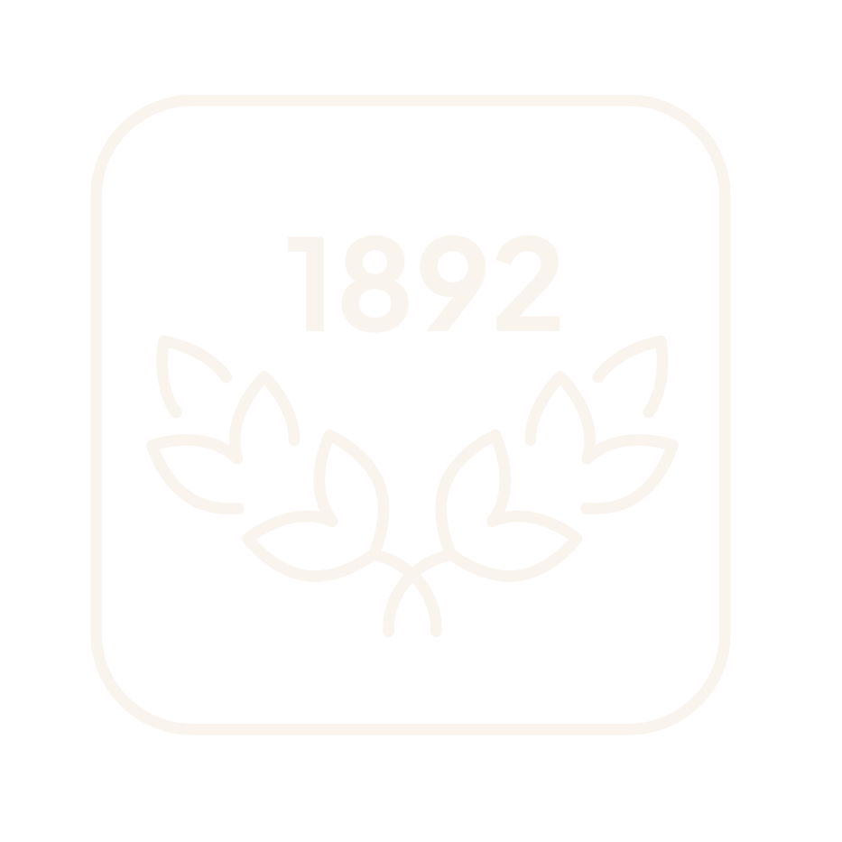 Icon featuring the year 1892 at the top, a stylized laurel wreath below, all enclosed in a rounded square outline. Depicting Loveday was established in 1892.