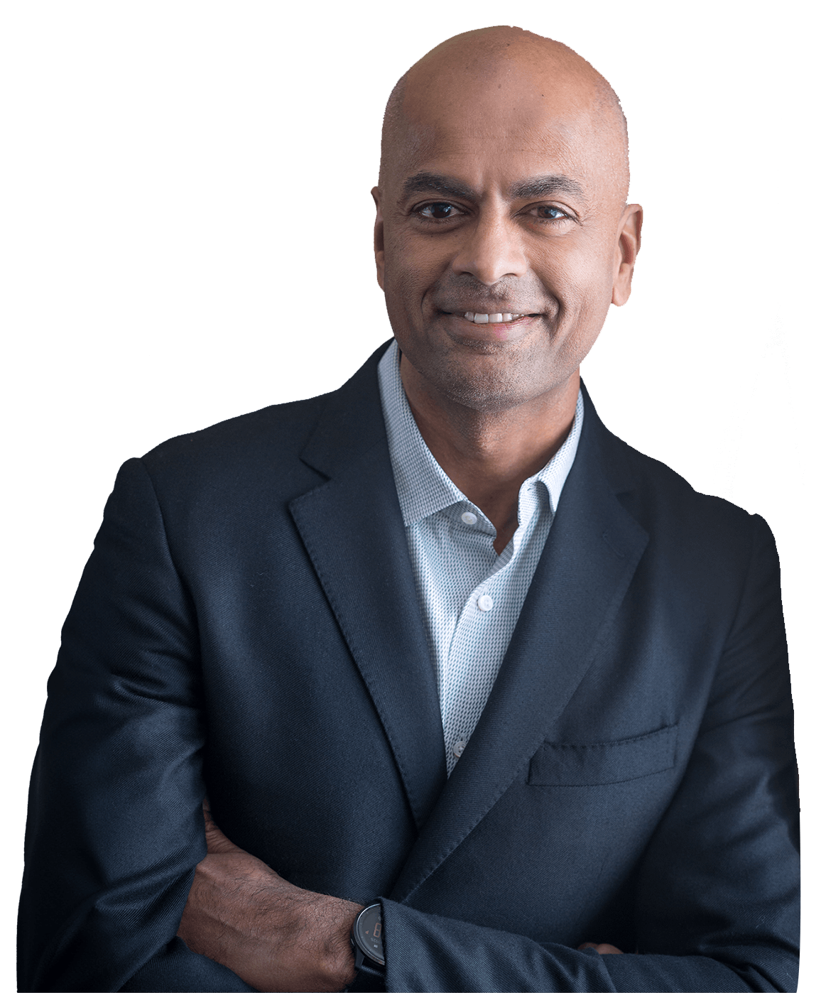 Professional portrait of a middle-aged bald man wearing a dark suit jacket, white shirt, smiling with arms crossed.