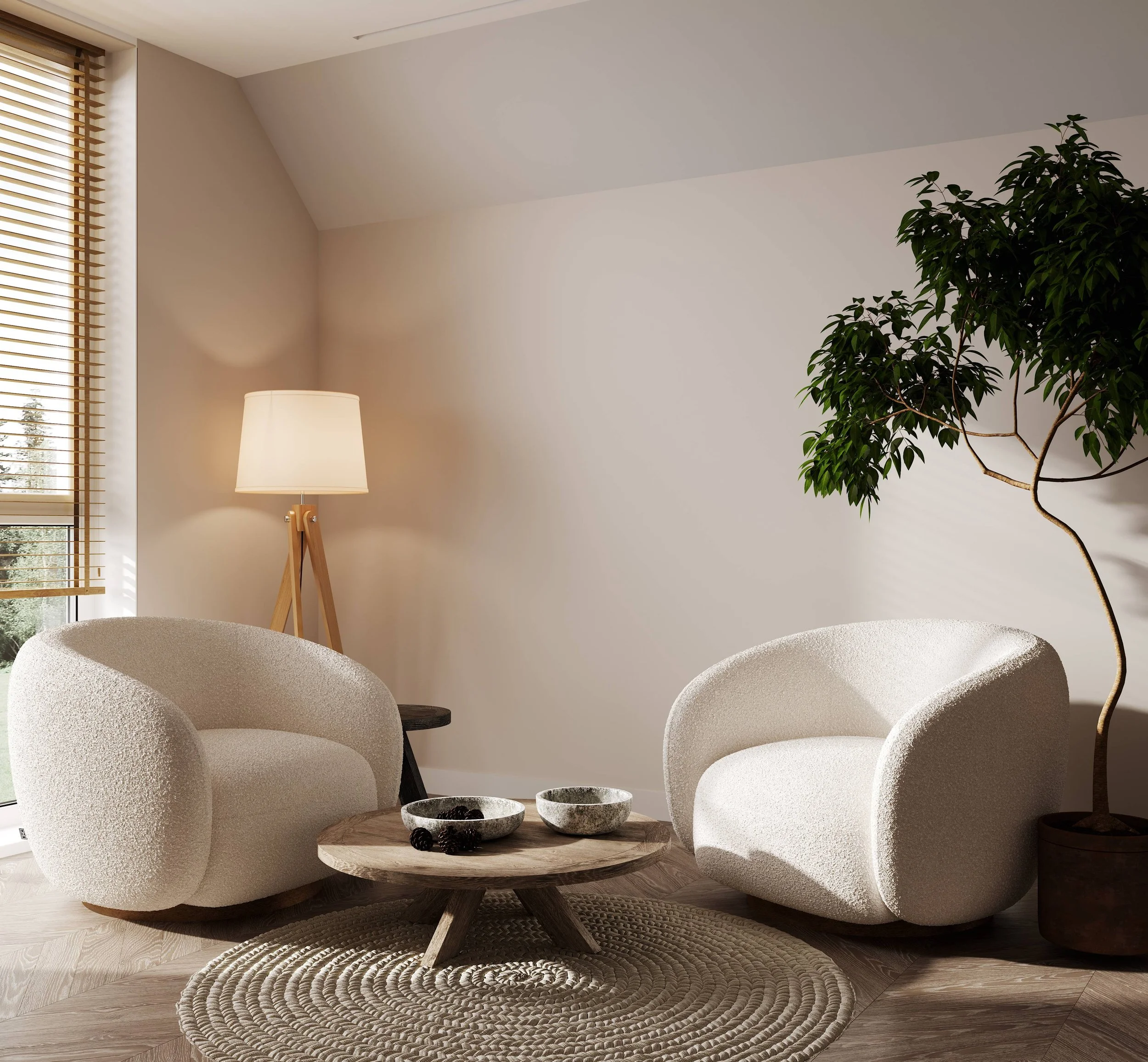 Living room with a large green indoor tree, a round woven rug, a wooden coffee table with three bowls, a beige armchair, a white floor lamp, a window with wooden blinds, and a sloped ceiling.