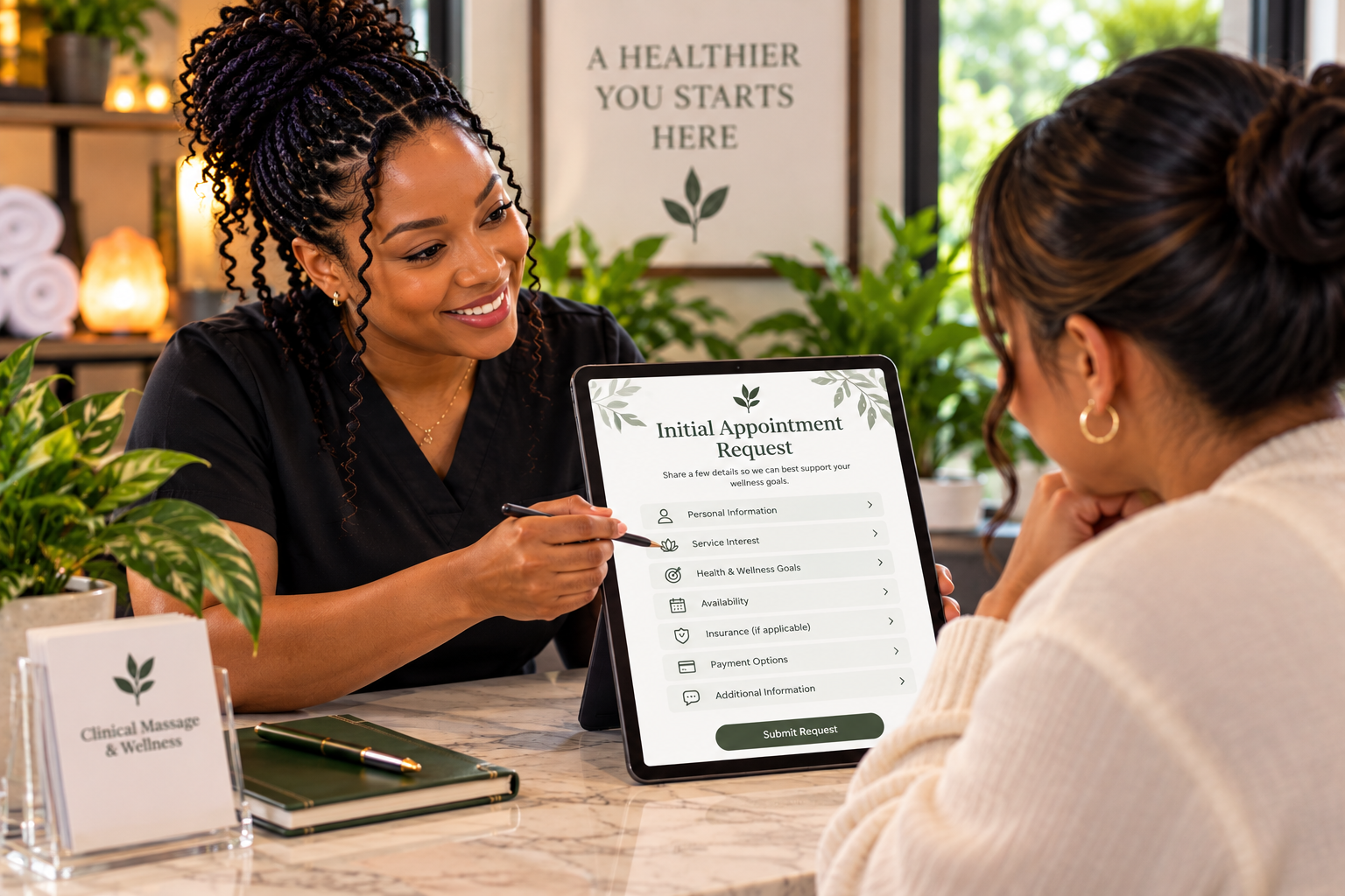 A healthcare professional sitting at a reception desk with a patient, showing a tablet with an appointment request form on the screen, surrounded by green plants and wellness-related decor.