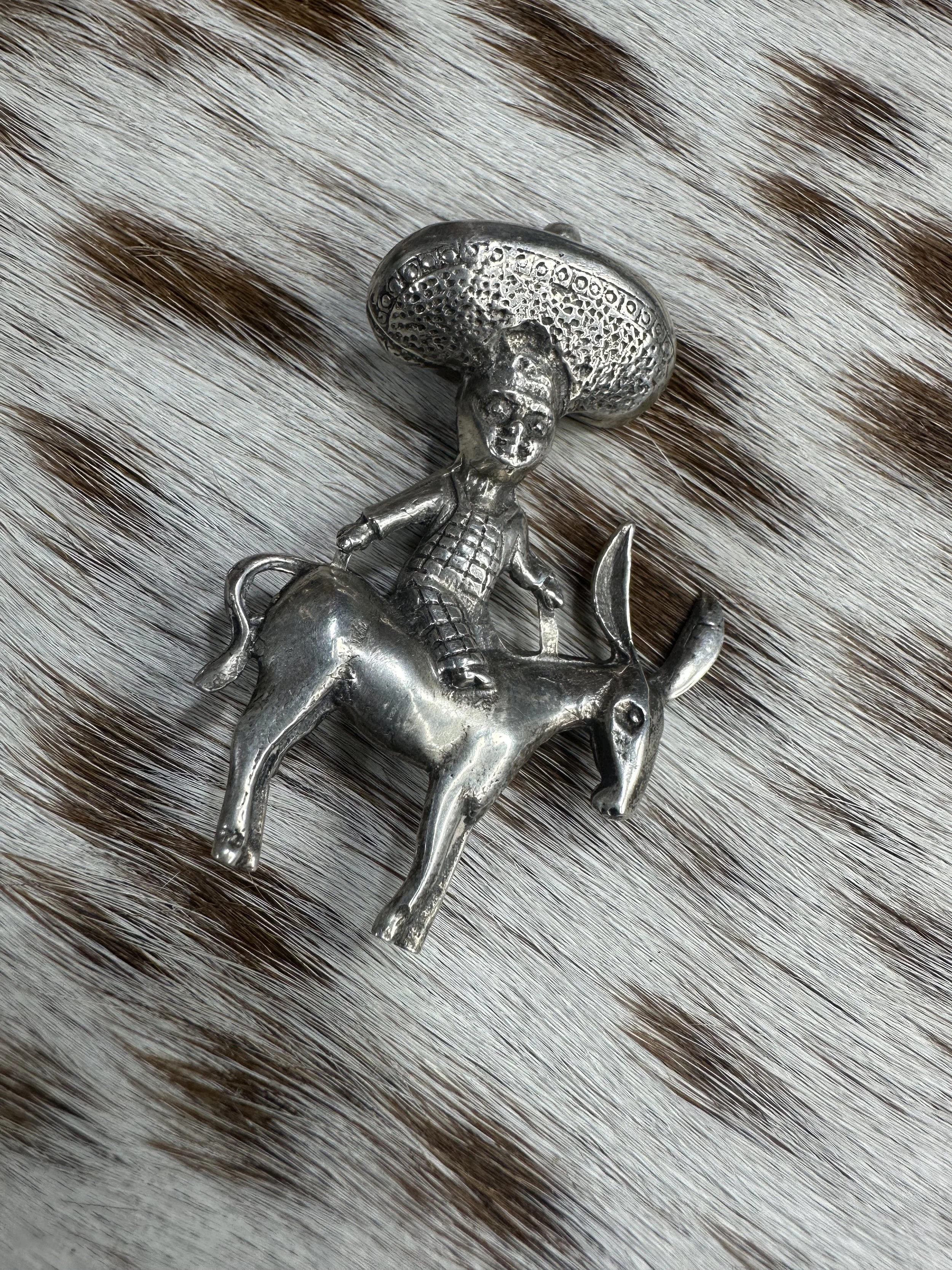 Stamped Cowboy and Donkey Brooch