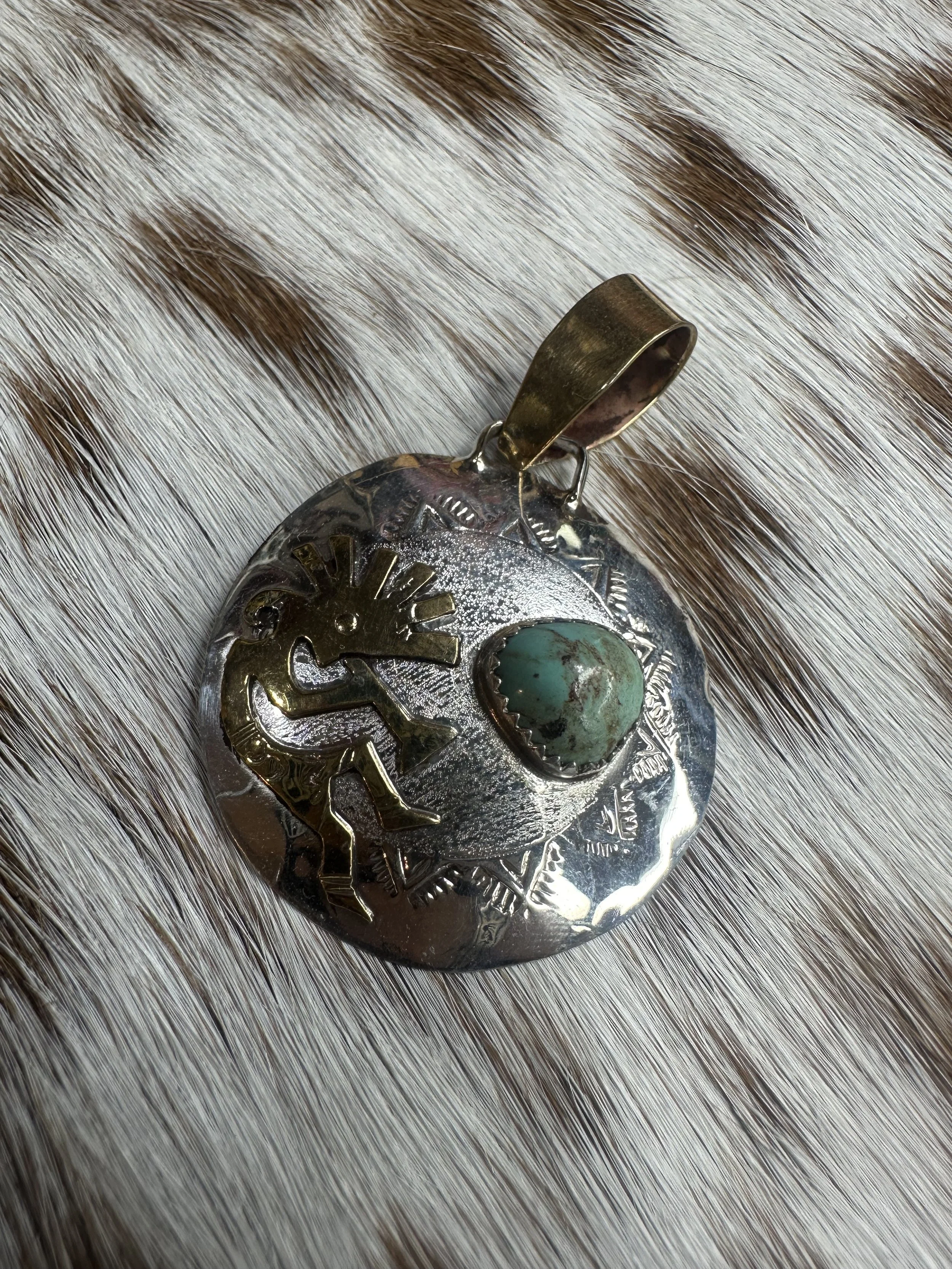 Geraldine James 12K / Sterling Kokopelli Pendant