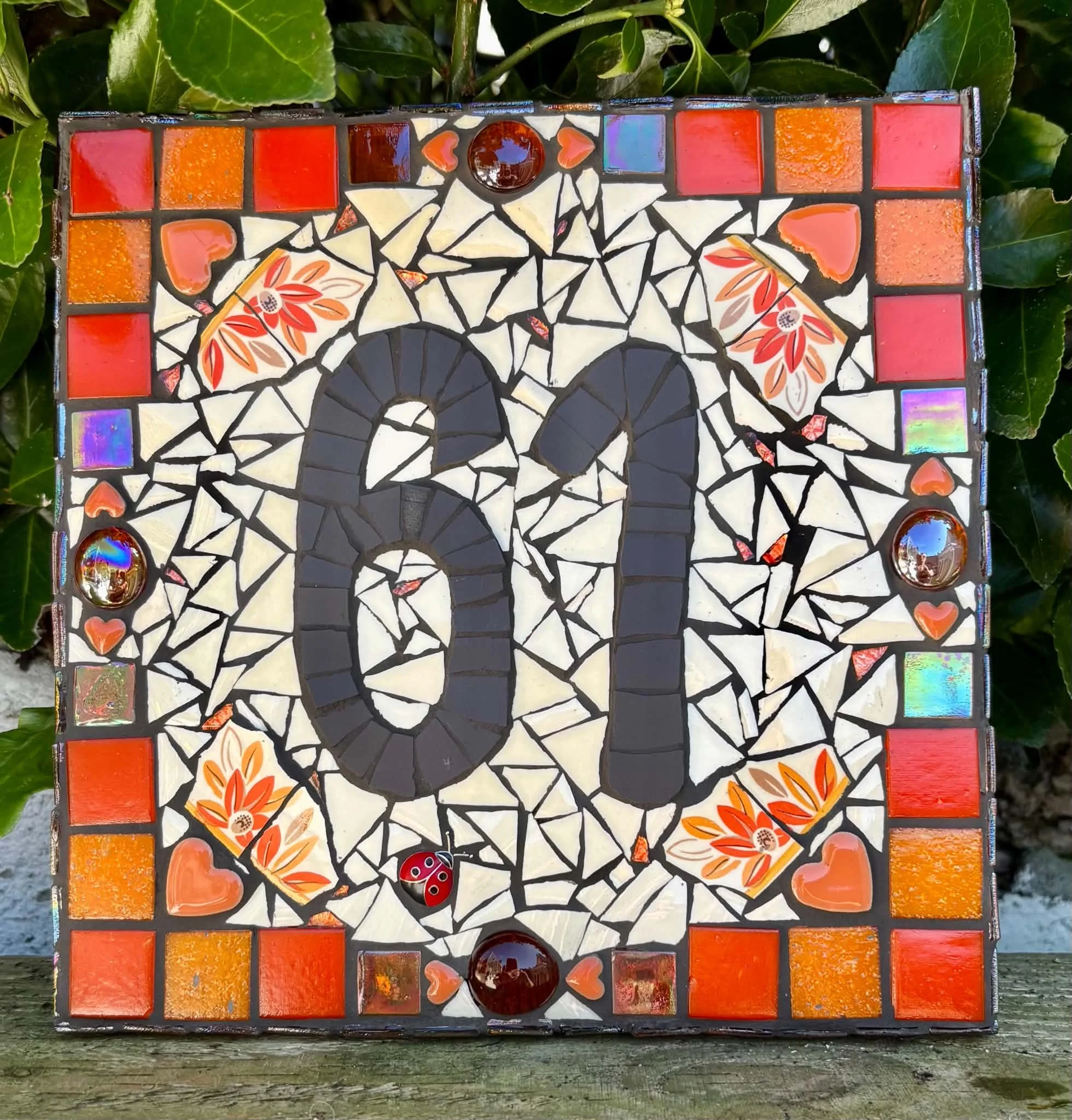 orange mosaic house number 61