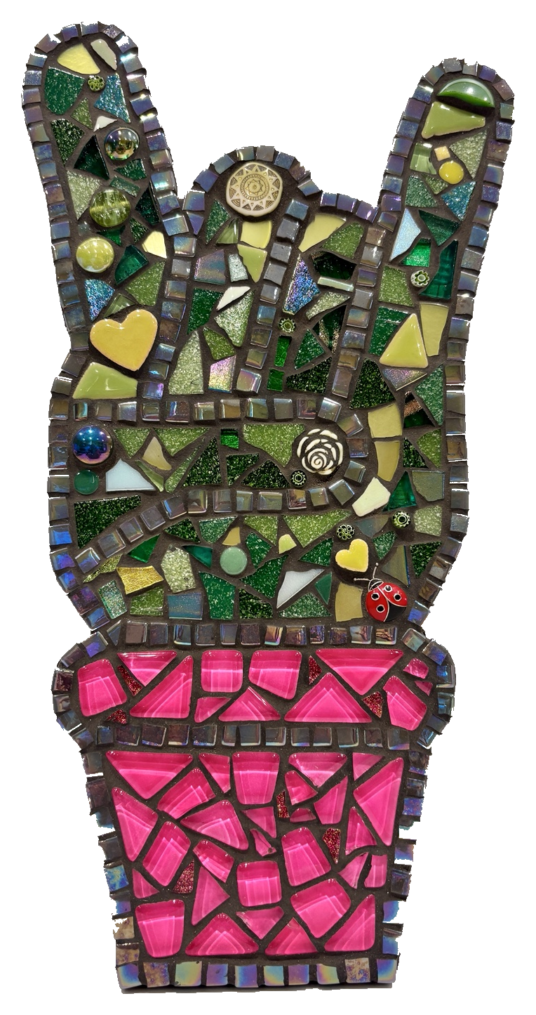 Colorful mosaic artwork of a potted plant made from various glass pieces, including hearts, circles, triangles, and squares in green, pink, yellow, and multicolor, with decorative elements like a ladybug and gears.