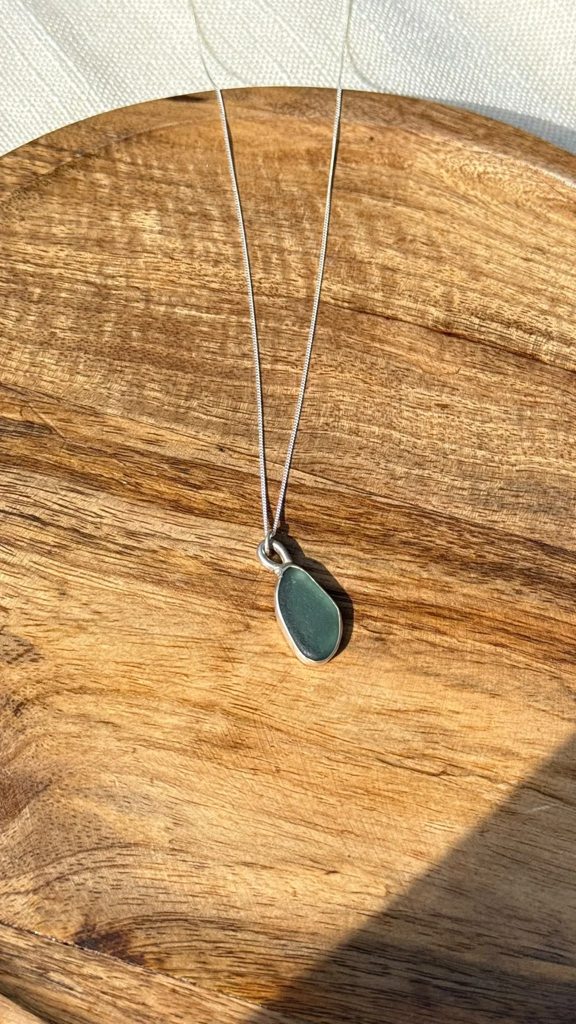 Teal tide pendant