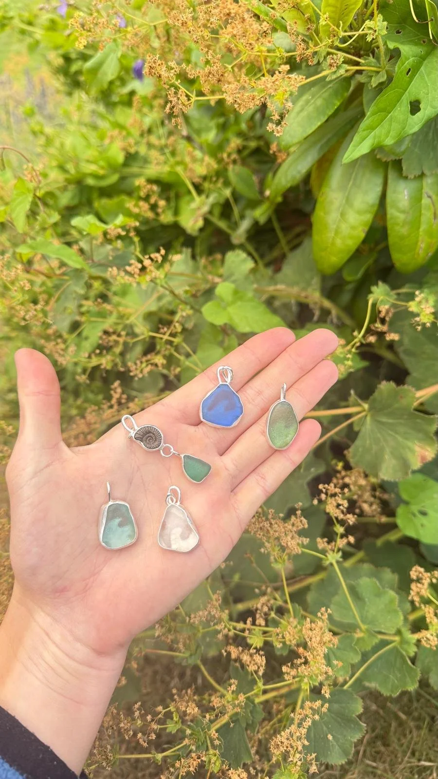 wave carved pendants