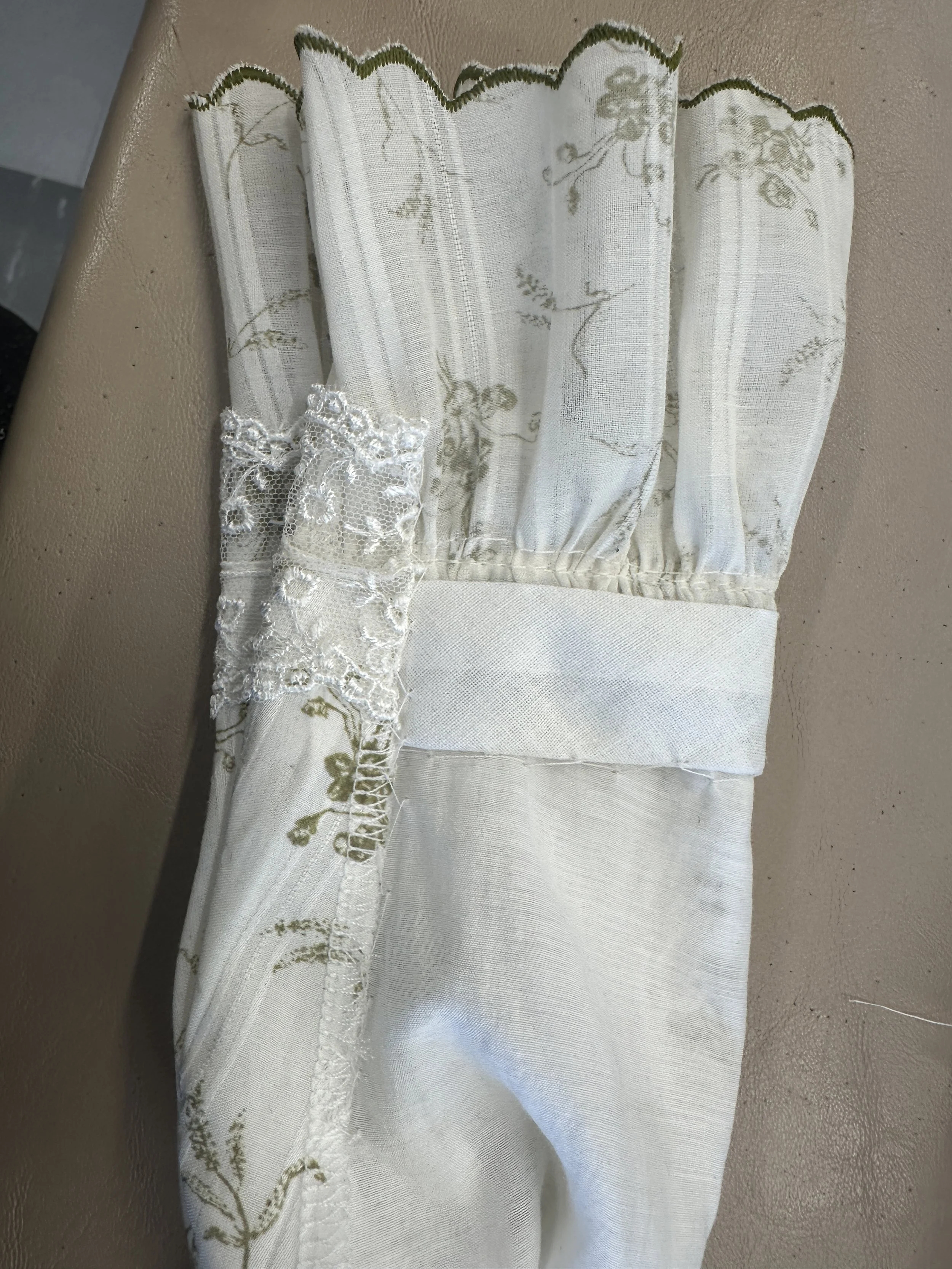 original finishing of cuffs with trim attached