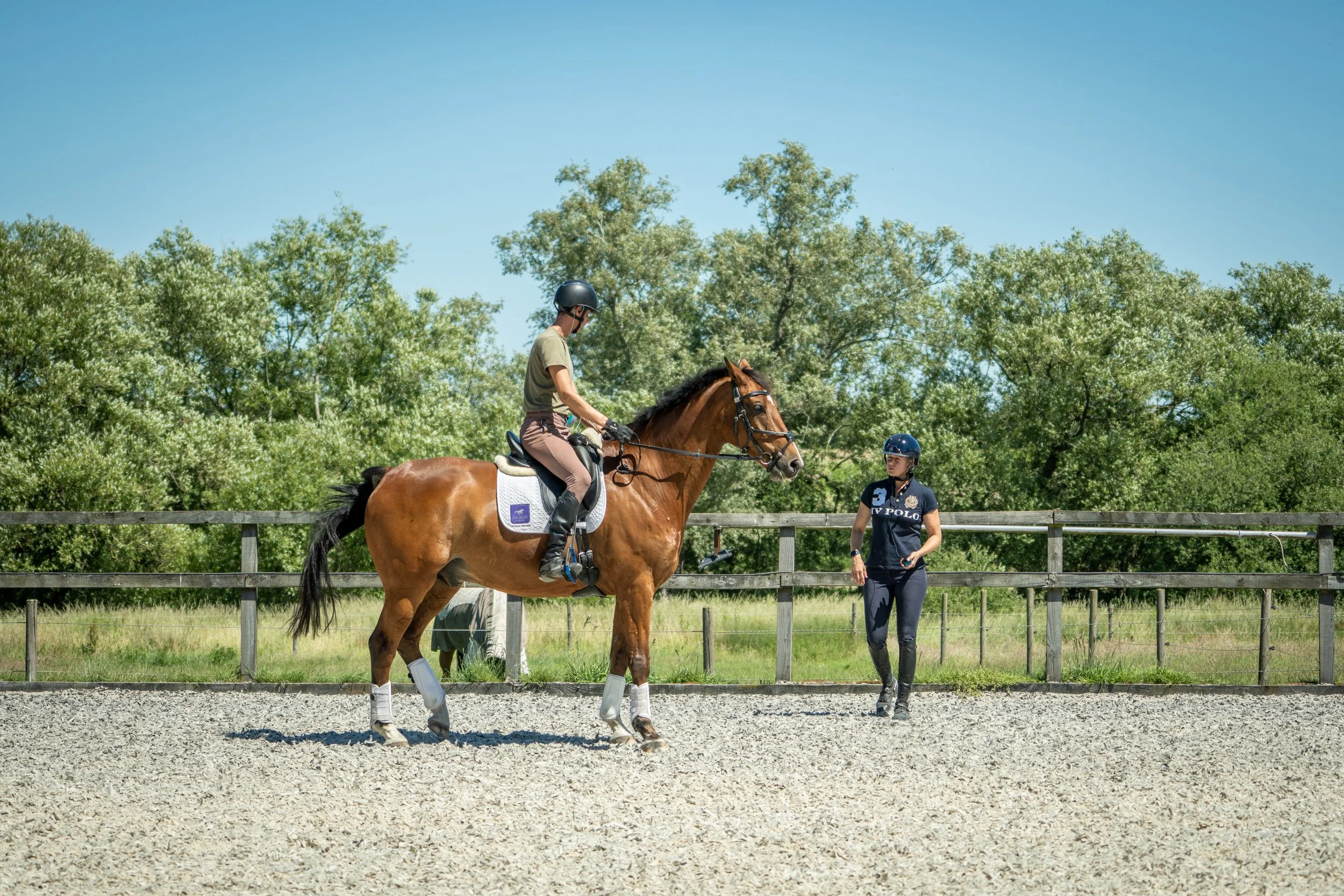 Christina Wiederkehr teaching dressage in the Swiss Eventing outdoor menage.