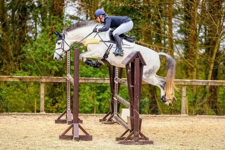 Christina Wiederkehr jumping her horse in a National Competition.