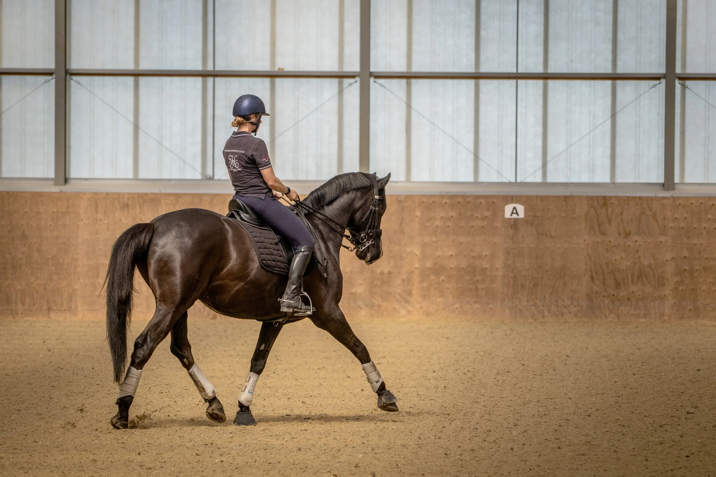 Christina Wiederkehr in training in the indoor arena at Swiss Eventing.