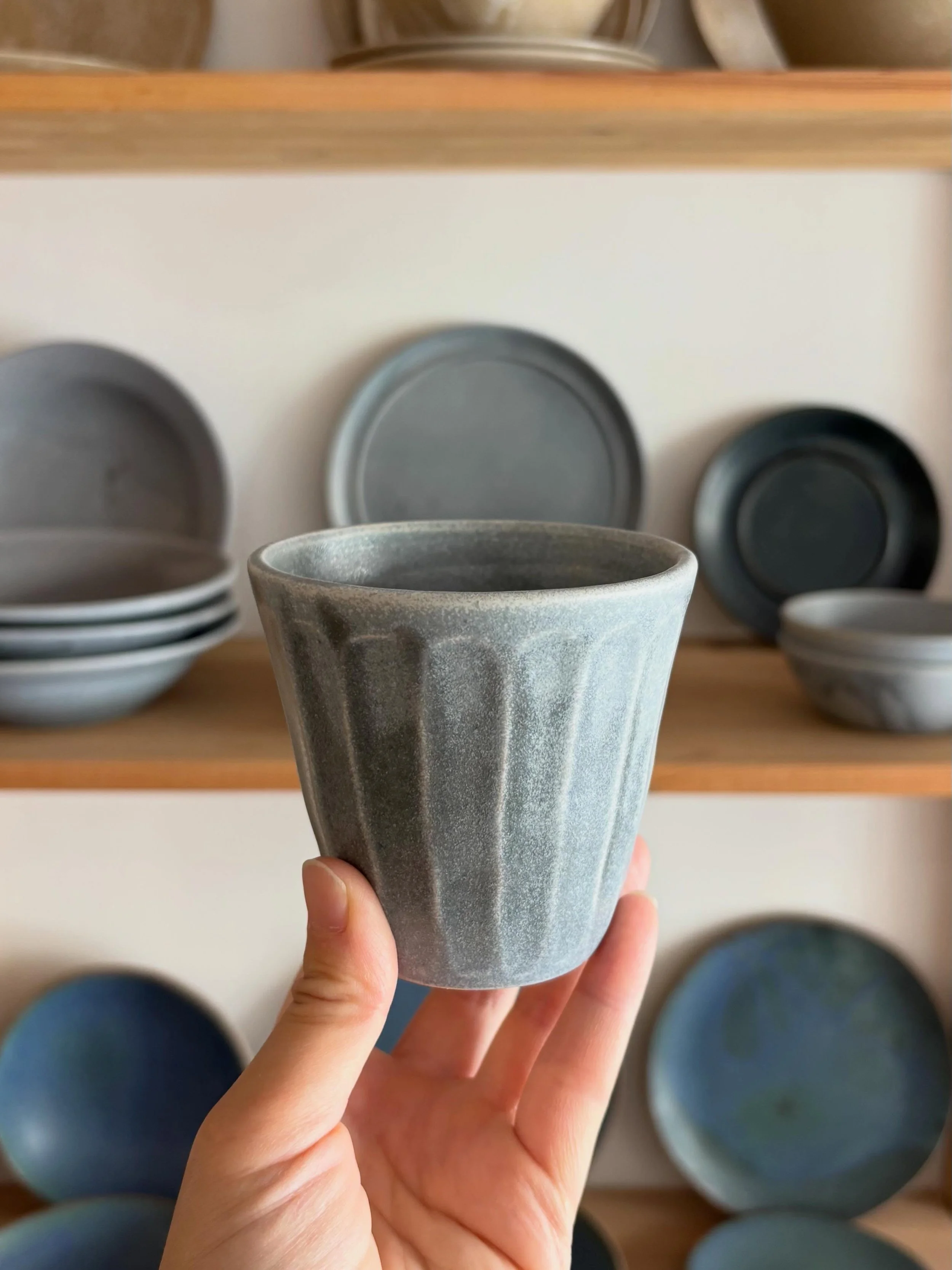 Faceted cup in this grey glaze we love so much #ceramica #ceramics #wheelthrown #instapotterylovers