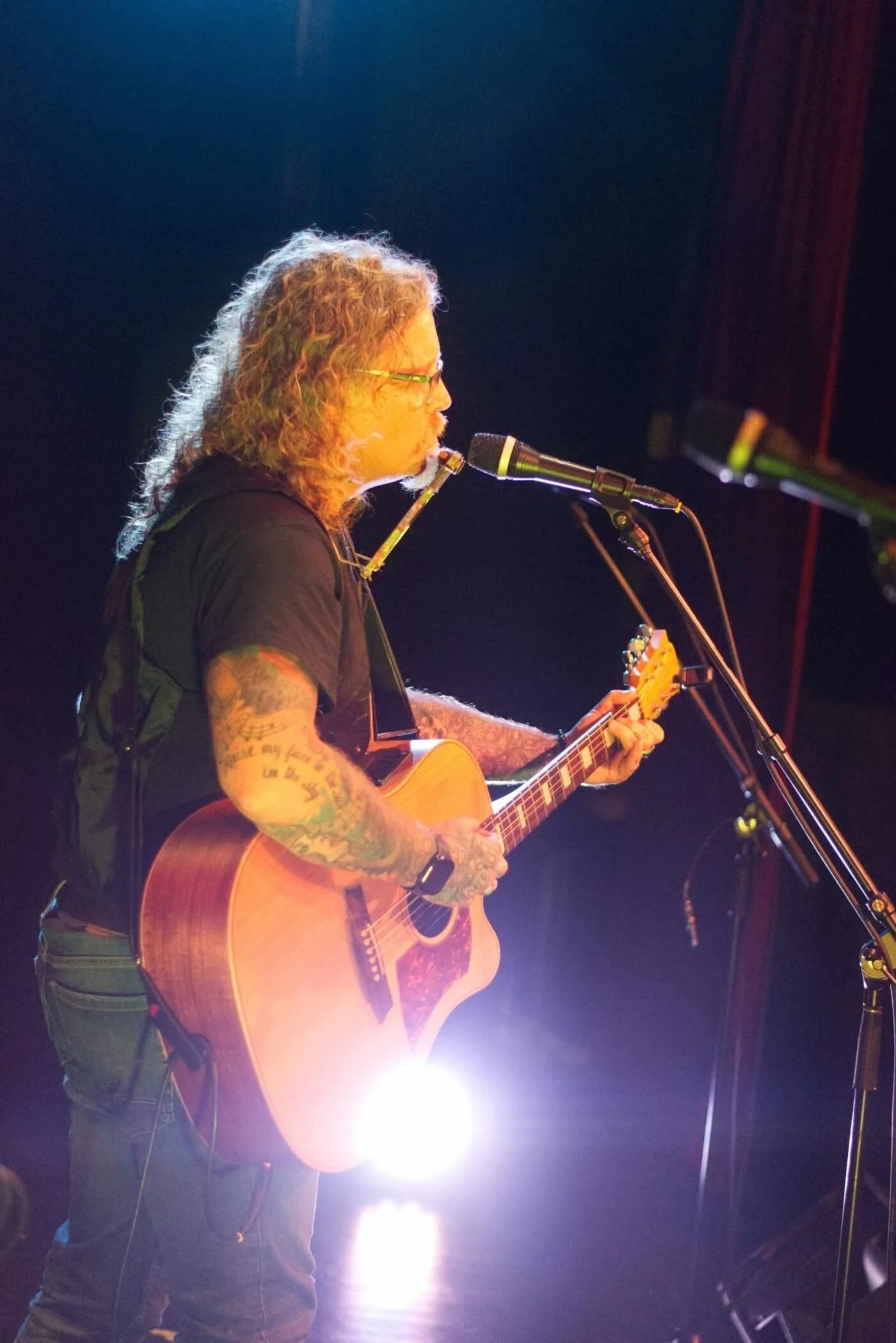 Tony performing original music live on stage