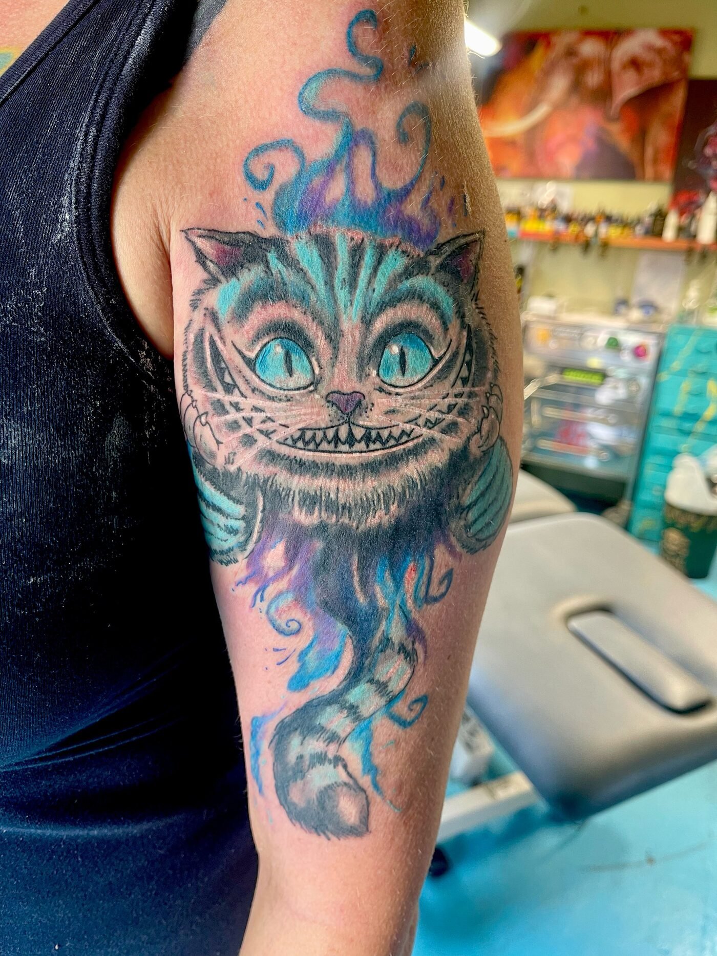 Cheshire cat tattoo design by Tony