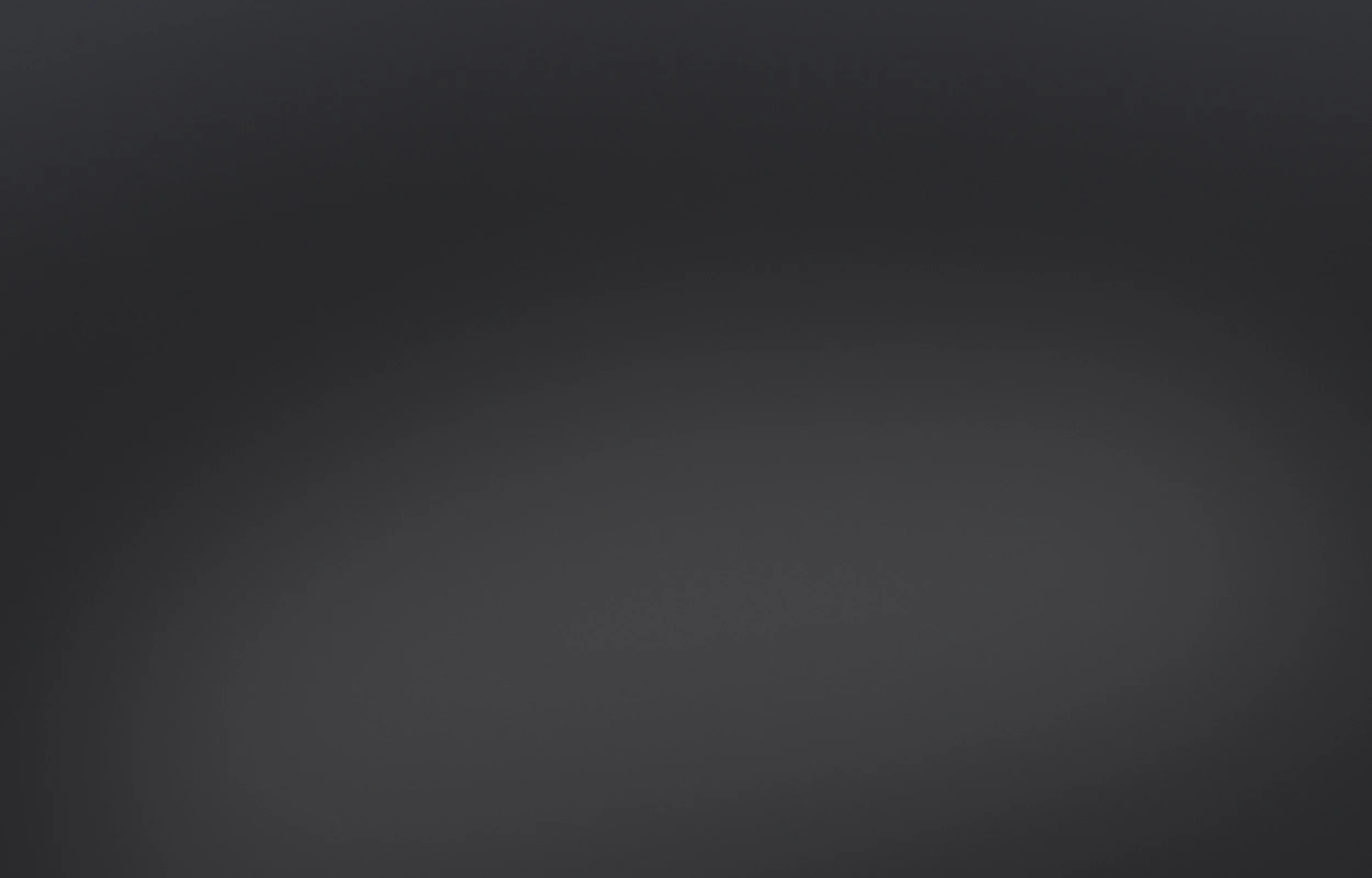 A blank, gradient background transitioning from dark at the top to darker at the bottom.