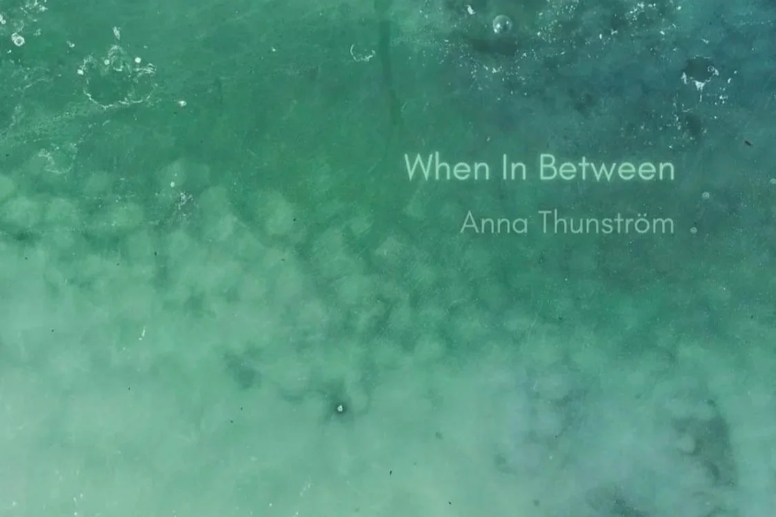 Cover of a book titled 'When In Between' by Anna Thunström with a green watercolor background.