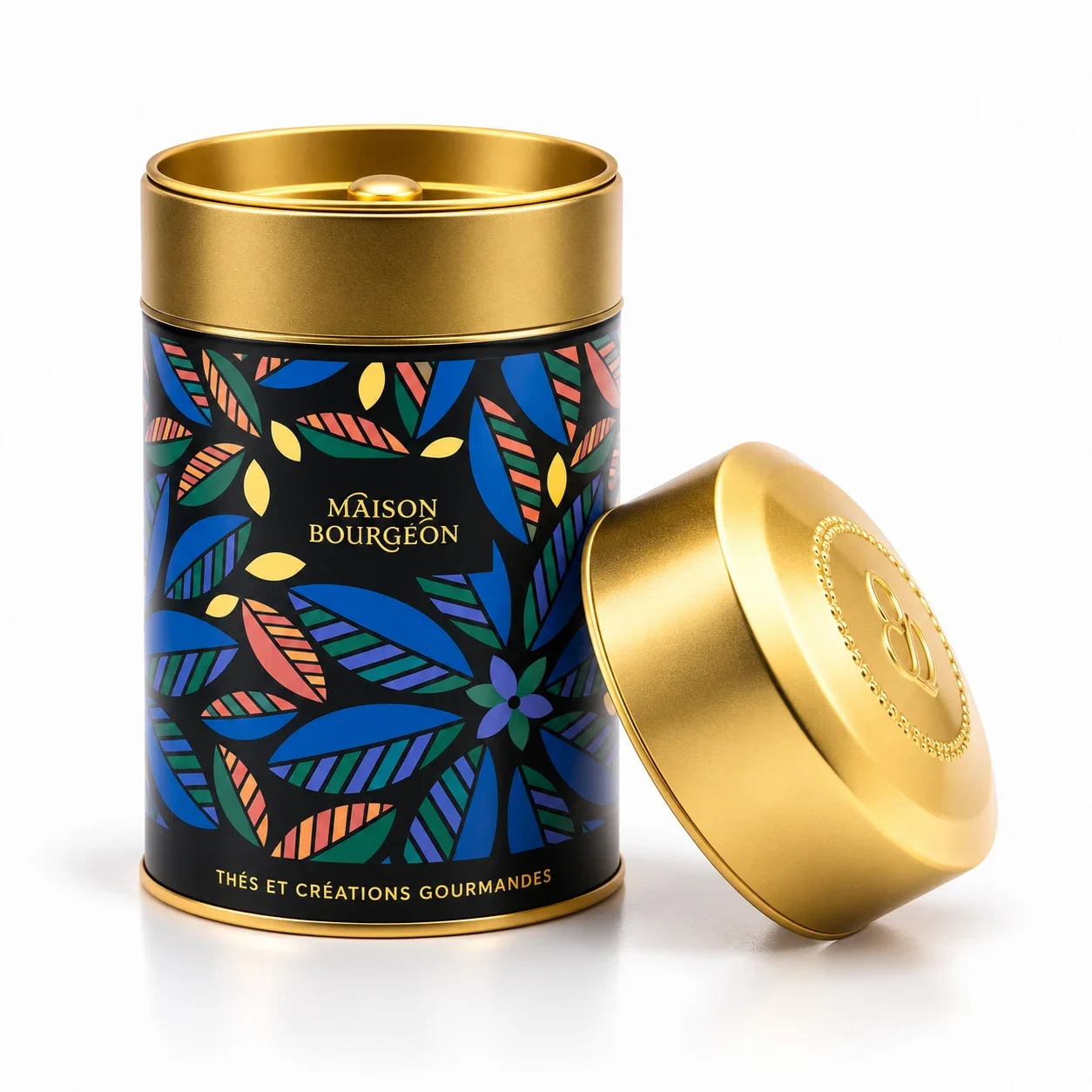 Boîte à thé décorative bleue et dorée Maison Bourgeon, disponible chez Canelés Arrangés à Montpellier.