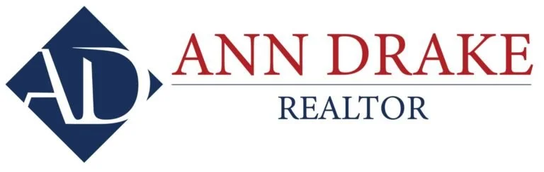 Logo for Ann Drake Realtor with initials 'AD' in a diamond shape and text next to it.