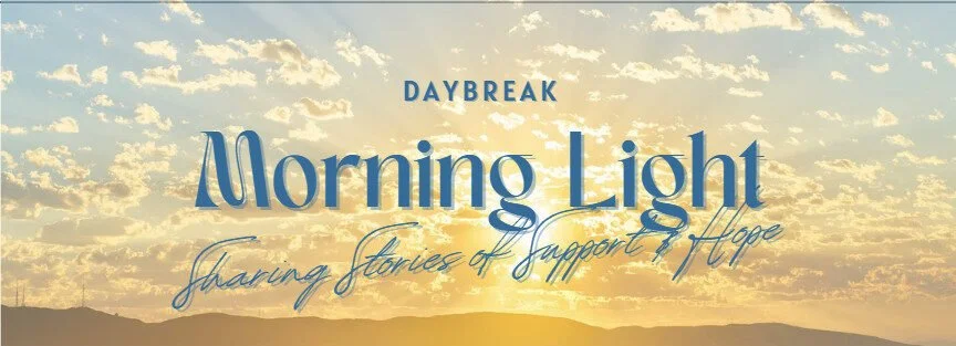 A sunrise over hills with the text 'Daybreak Morning Light Sharing Stories of Support & Hope' in front.