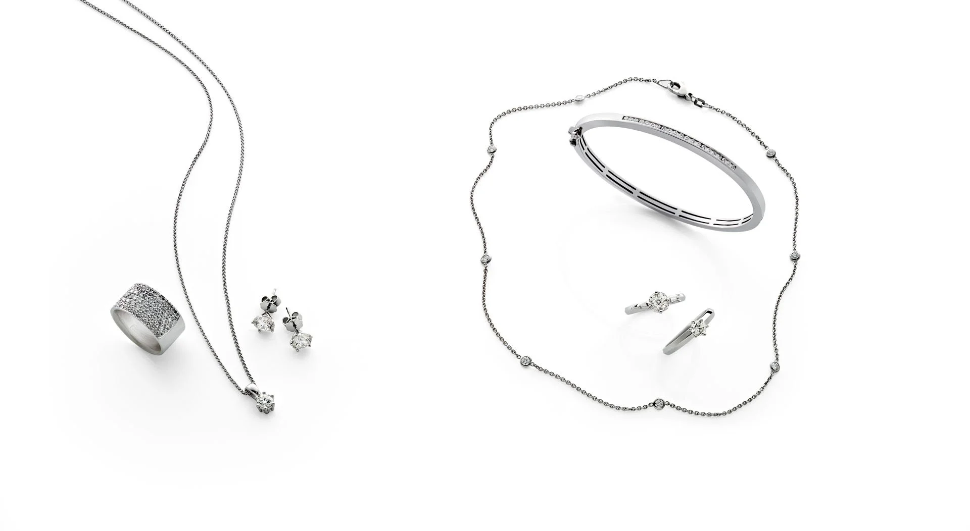 Weißgold-Schmuckset mit Diamanten auf weißem Grund, Produktstrecke für Schustermann & Bornstein – Retusche Bildergut.