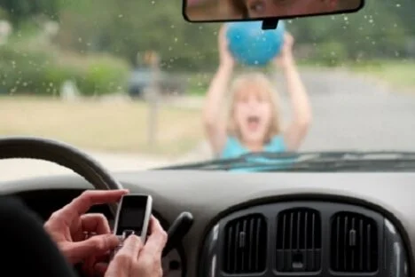 Cops tell drivers, 'Get your head out of your apps'