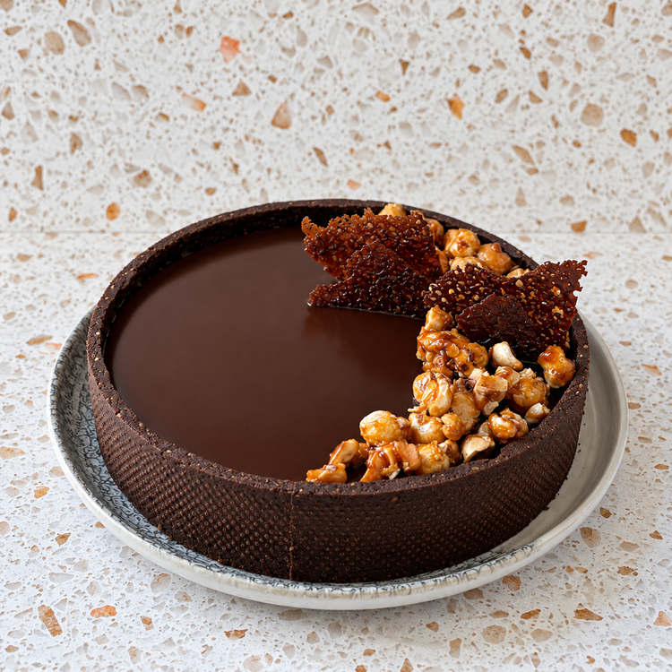 Chocolate Tart with praline, hazelnuts and cocoa tuile