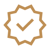 A gold badge with a checkmark in the center