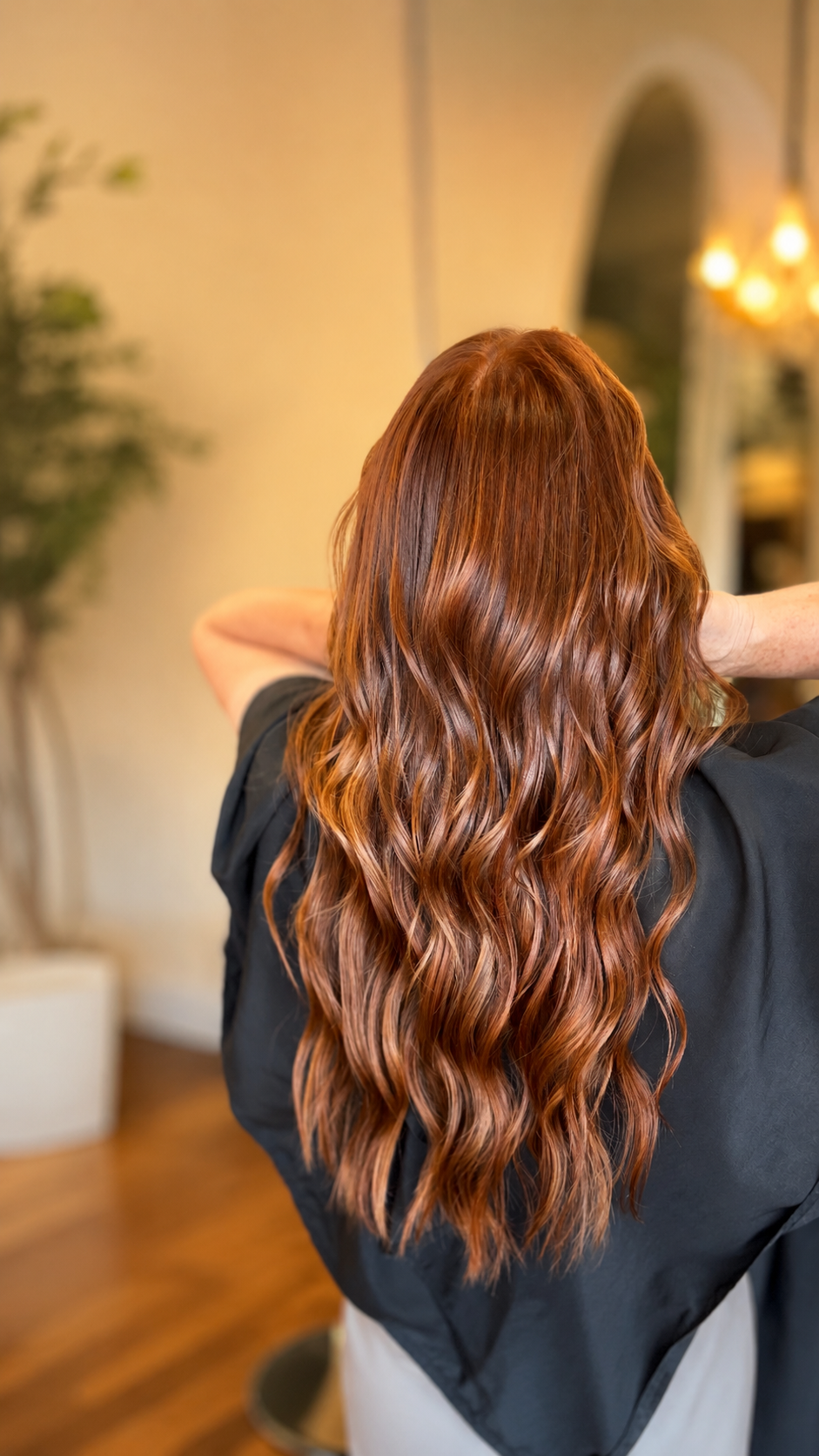 Rich auburn dimensional color with long soft waves at The Hair Canvas in Ashland, KY.