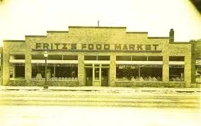 Old photograph of Fritz's Food Market storefront with a brick facade and large windows.