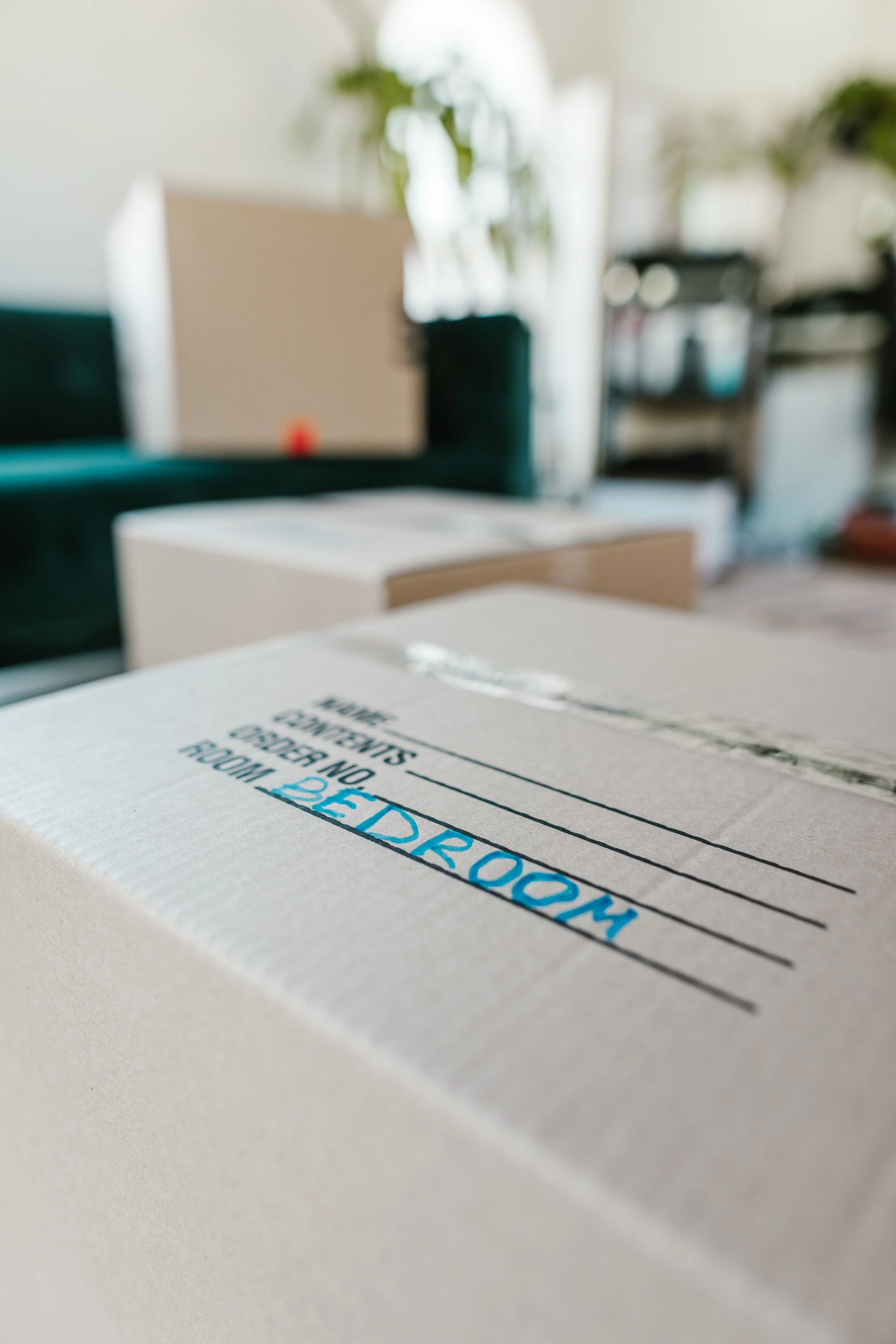 Labeled moving box packed and ready for an organized home move.