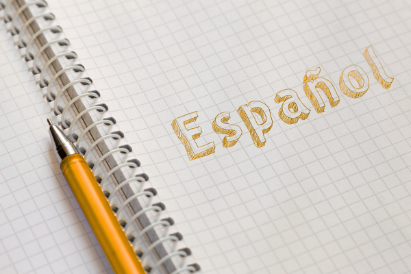 A Pad and Pen with the word Español written on it to represent Spanish Lessons with Spanish Tutoring Bucks