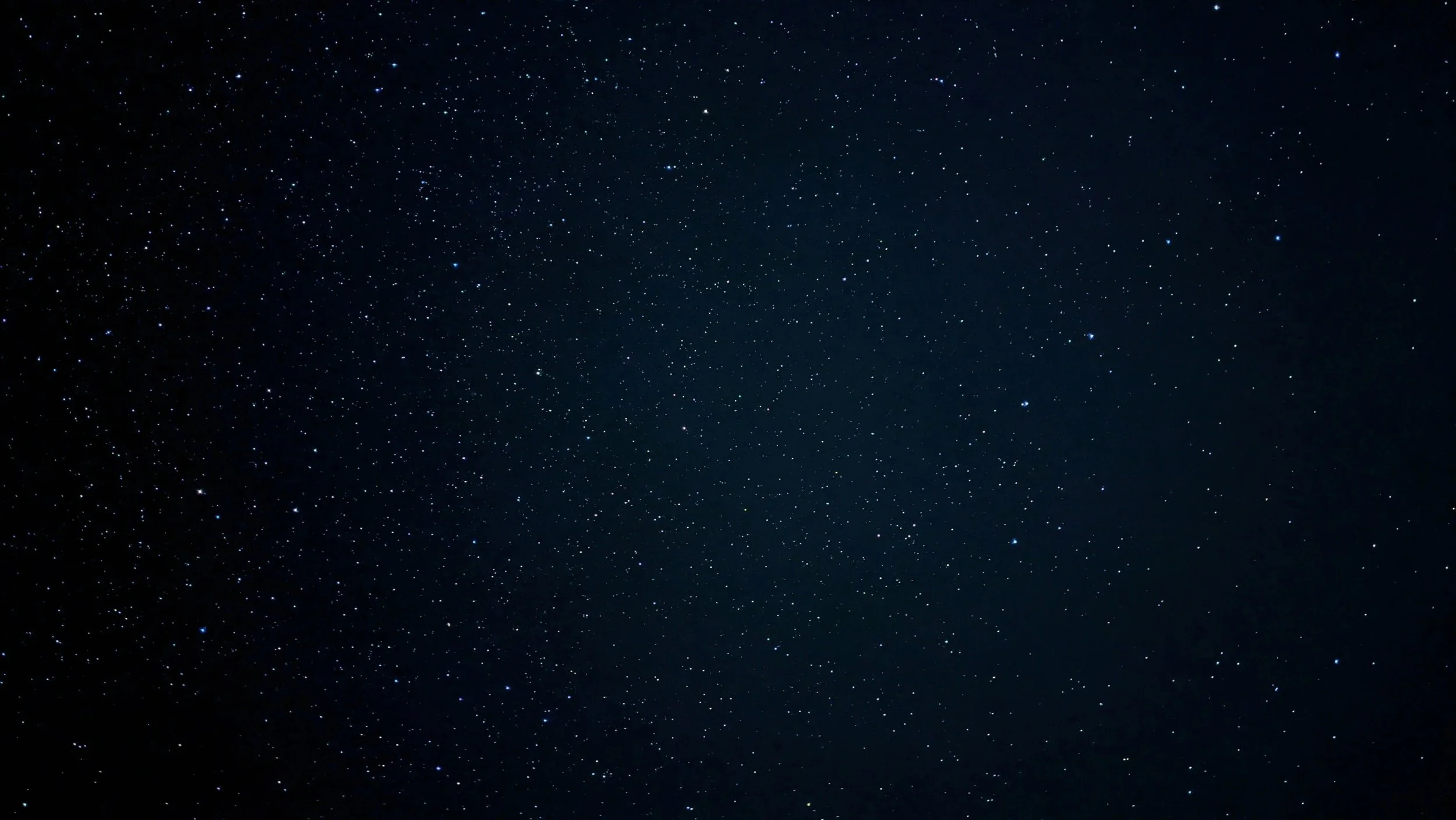 A clear night sky filled with numerous stars.