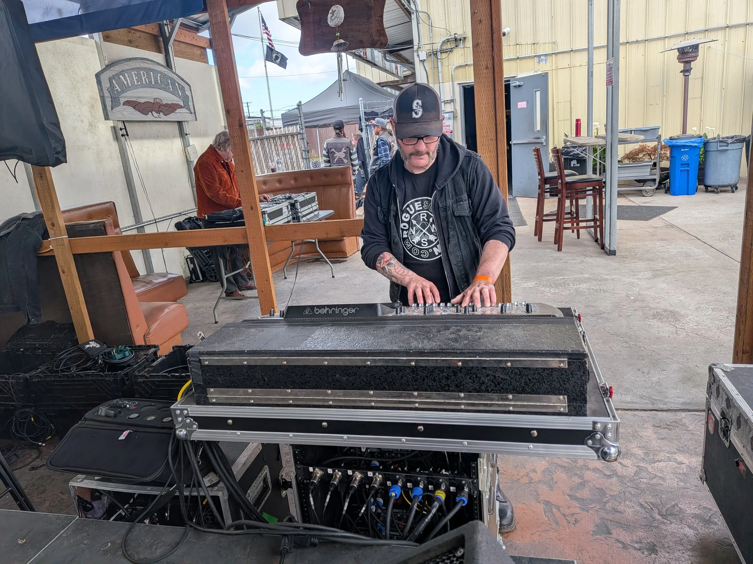 One of the Rogue Sound engineers setting the scene on the mixer, preparing for a show.