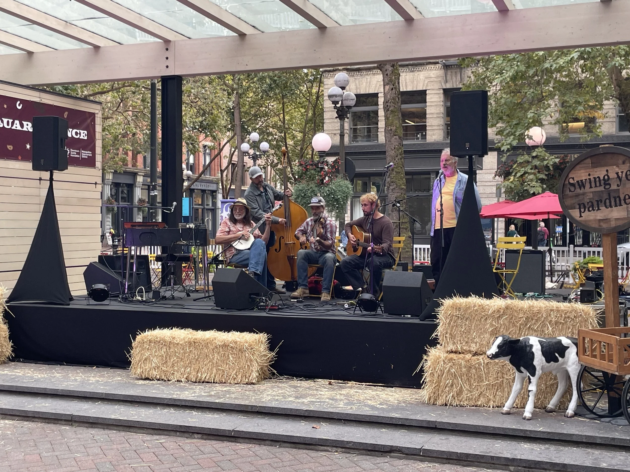 A local bluegrass band on stage for the Pioneer Square Dance program in downtown Seattle.