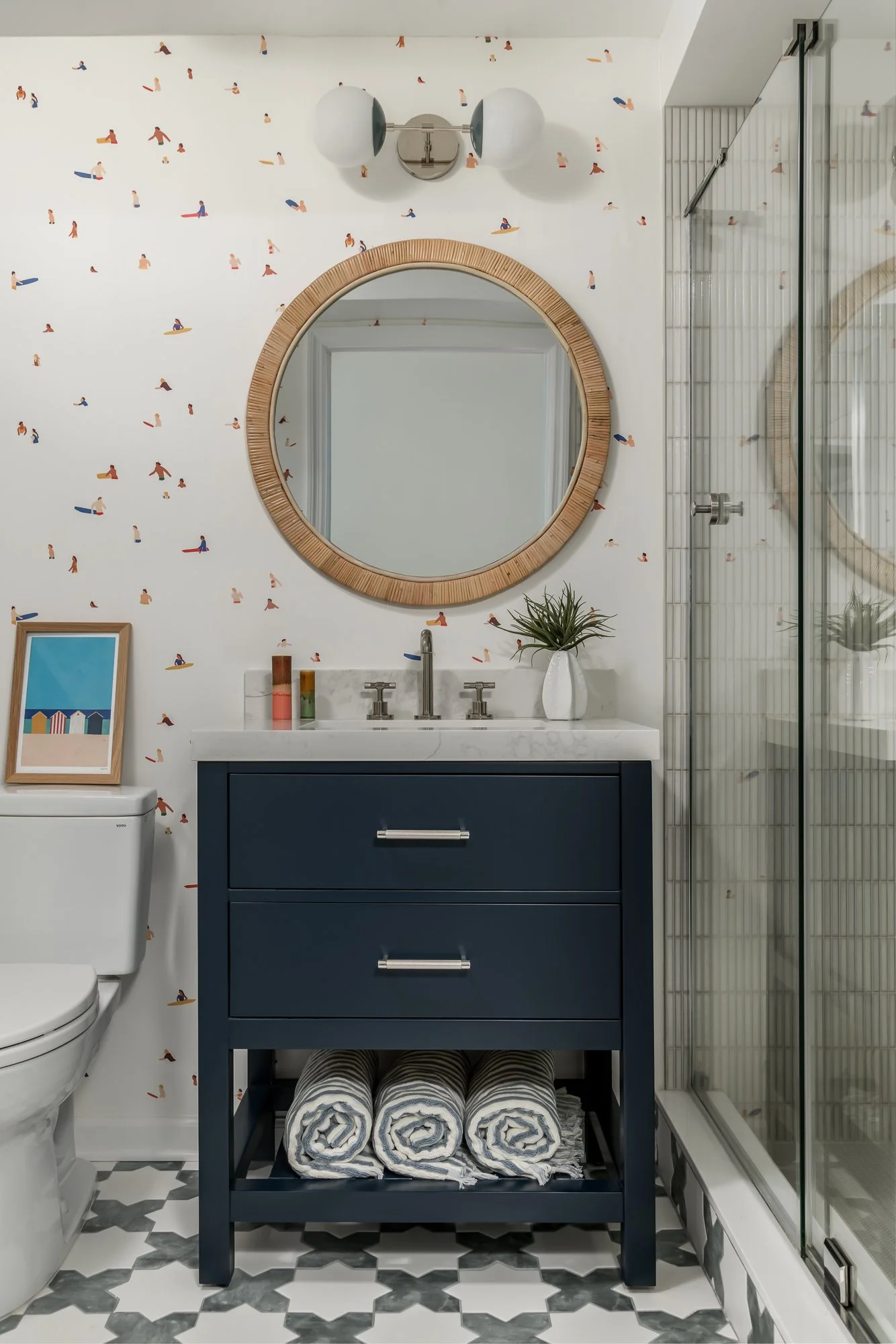 powder room with patterned wallpaper