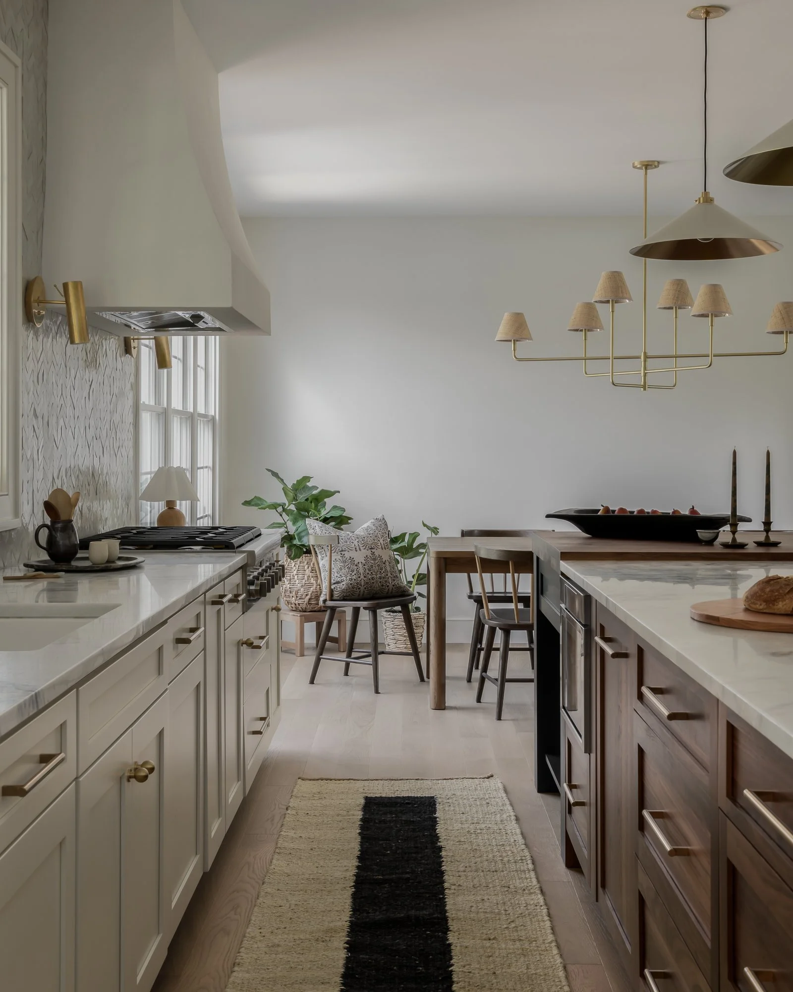 kitchen with white cabinetry and dark center island