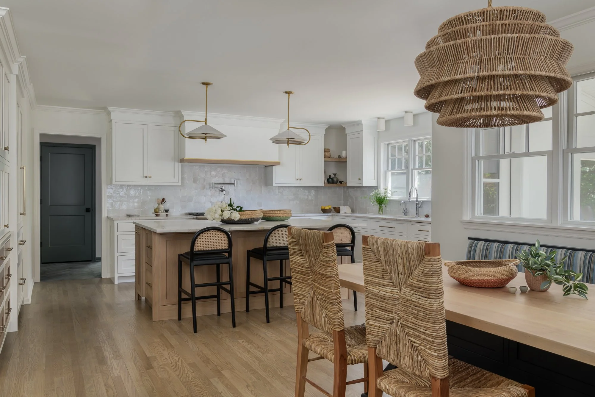 kitchen white cabinetry and rattan details