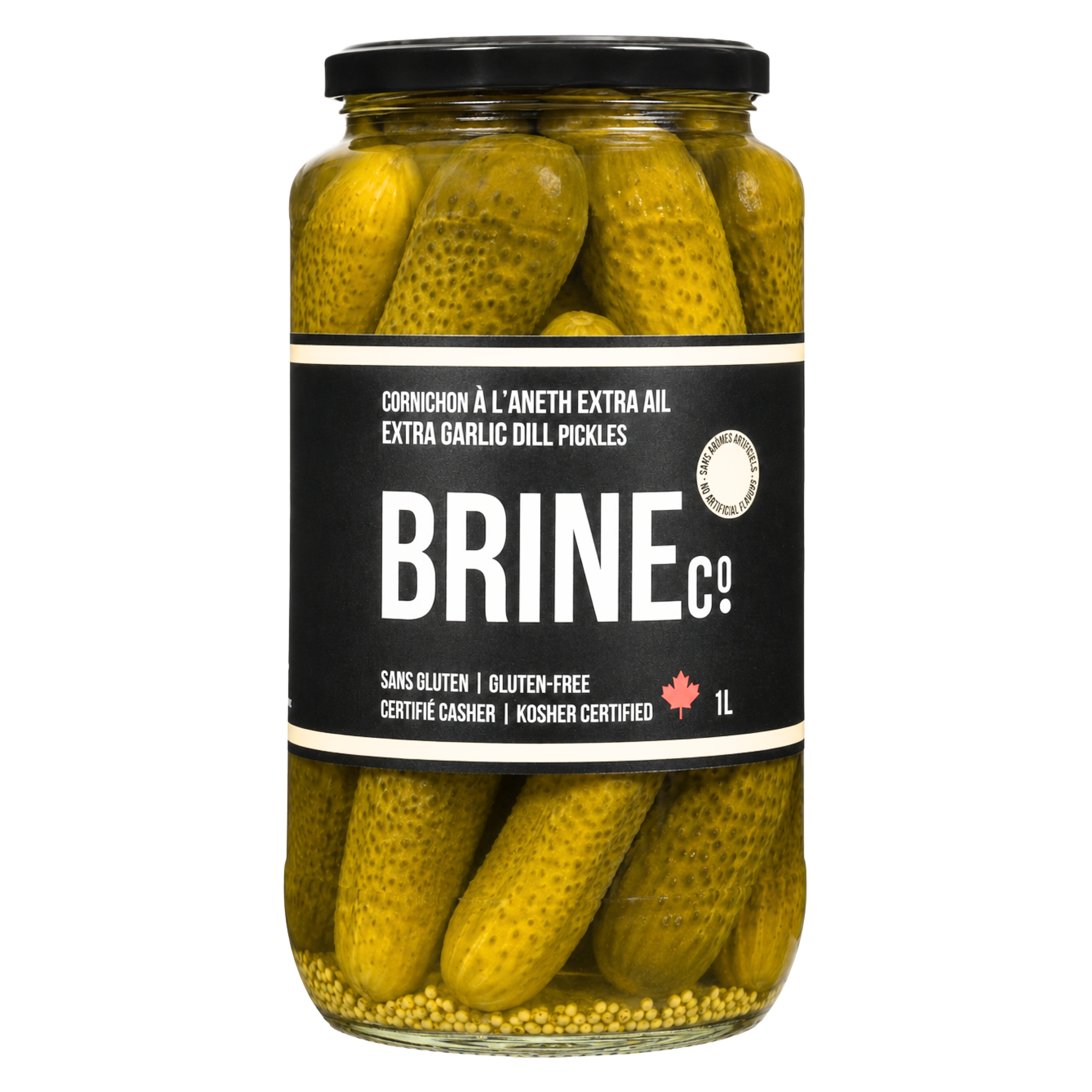 A glass jar filled with yellow pickles immersed in brine, labeled as extra garlic dill pickles, gluten-free, kosher certified, with a black lid and black label.