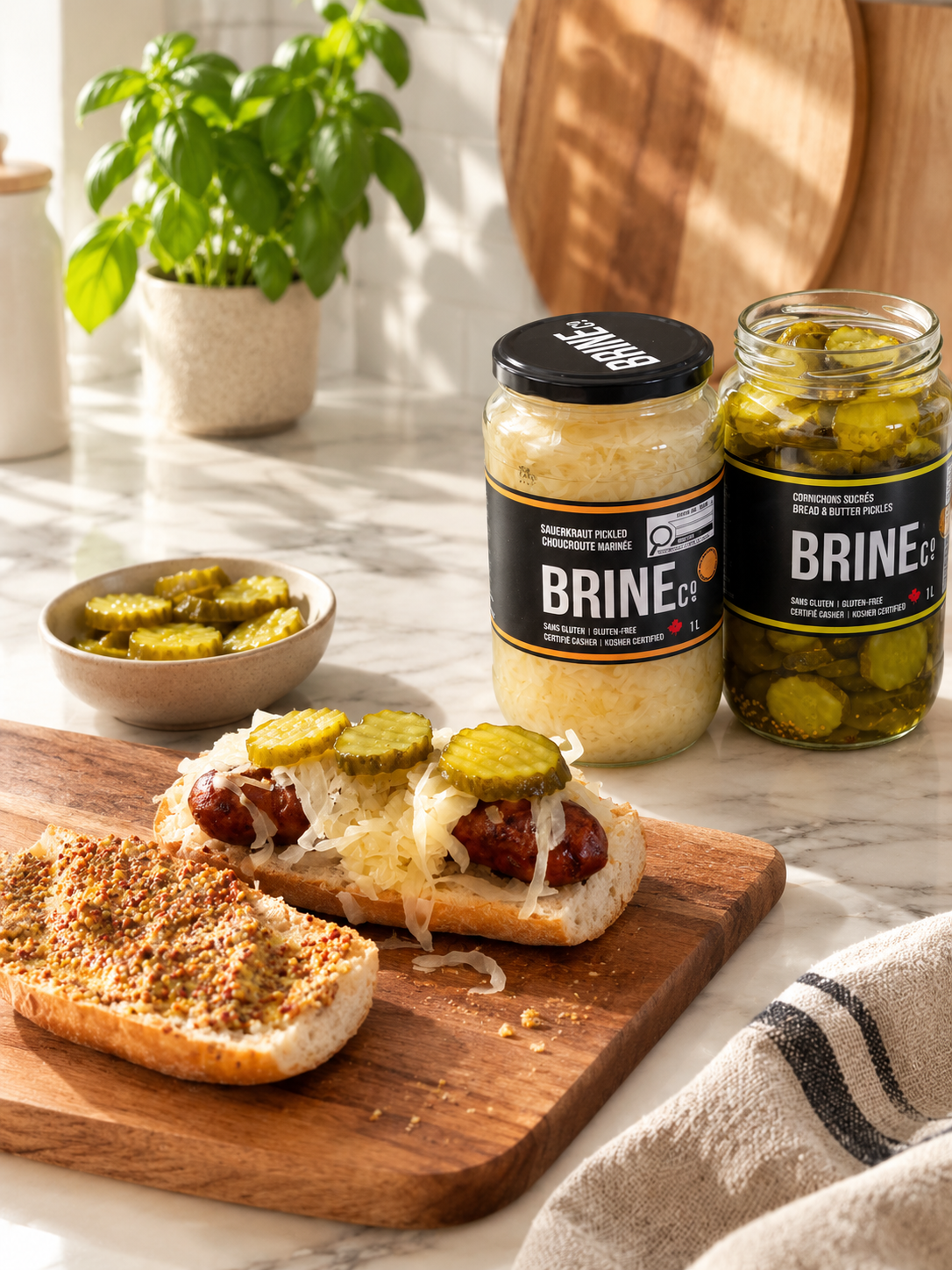 Sausage bun topped with Brine Co. sauerkraut and mustard.