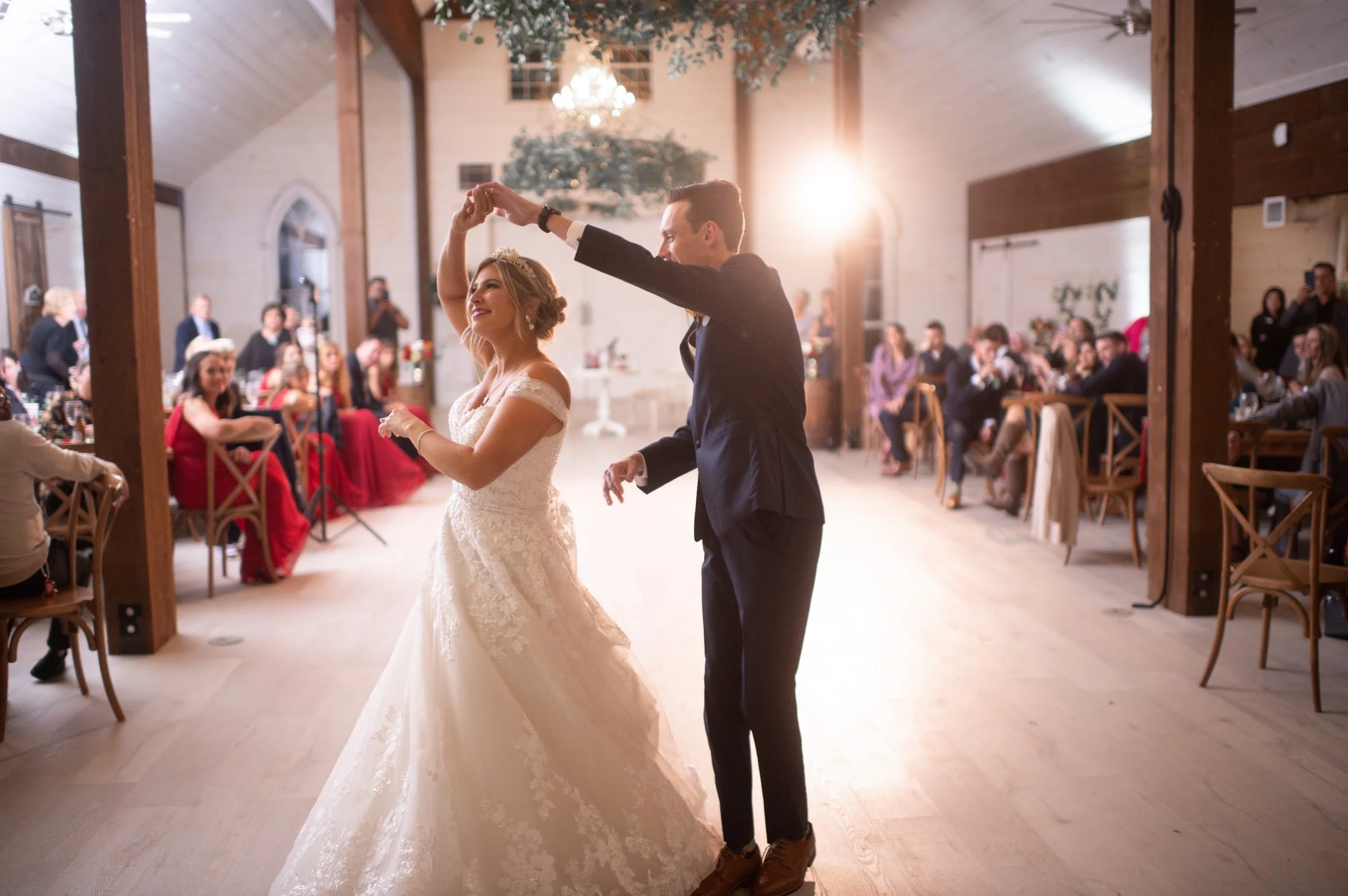 All About Ballroom students sharing their first dance at their wedding reception.