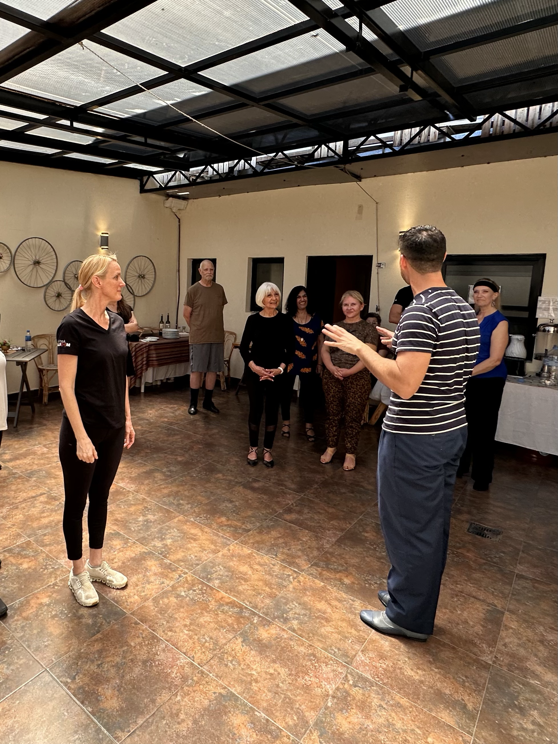 Heather Kornick and Cesar Davalos demonstrating Argentine Tango during a dance lesson in our hotel during an All About Ballroom dance retreat.