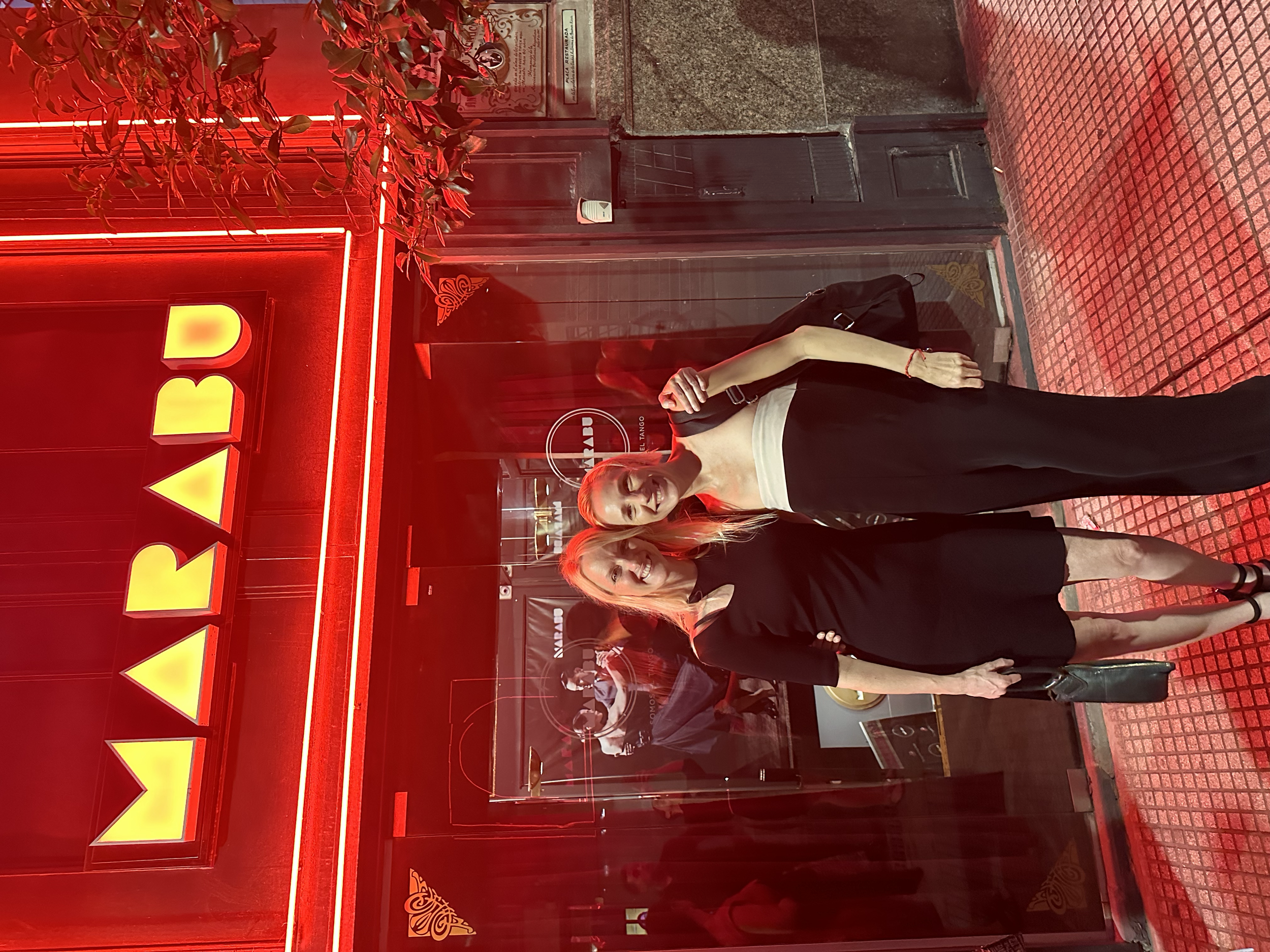 Heather Kornick and Roxana Marinoff outside of Marabu Milonga during an All About Ballroom dance retreat in Buenos Aires.