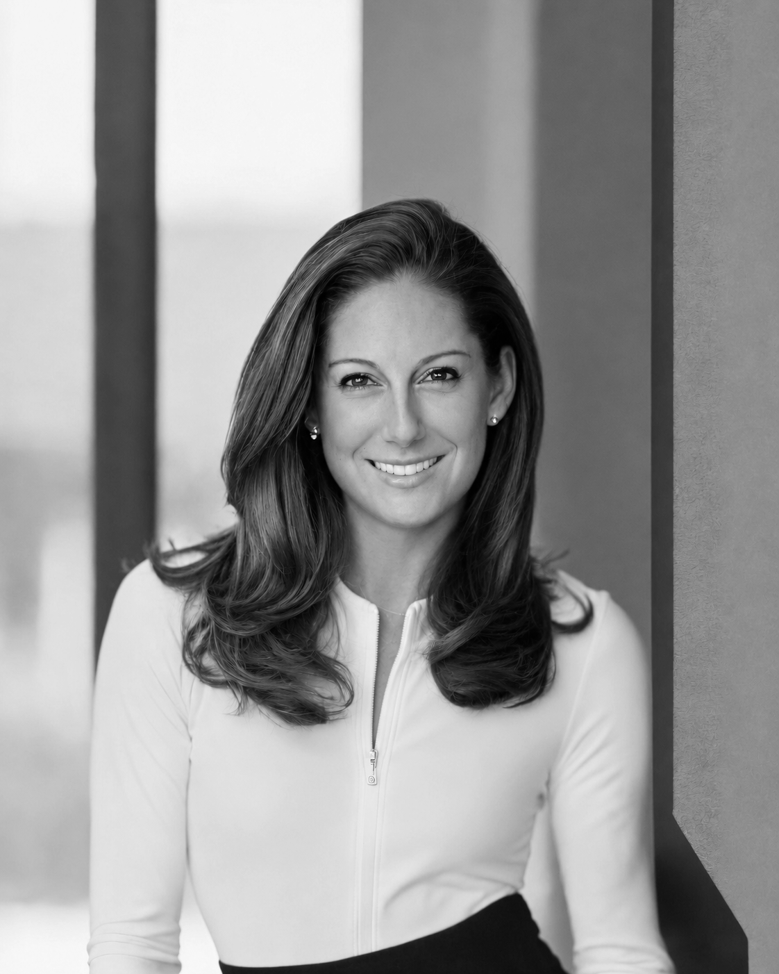 Black-and-white portrait of Jen Cortellini, founder of The Finishing Table.