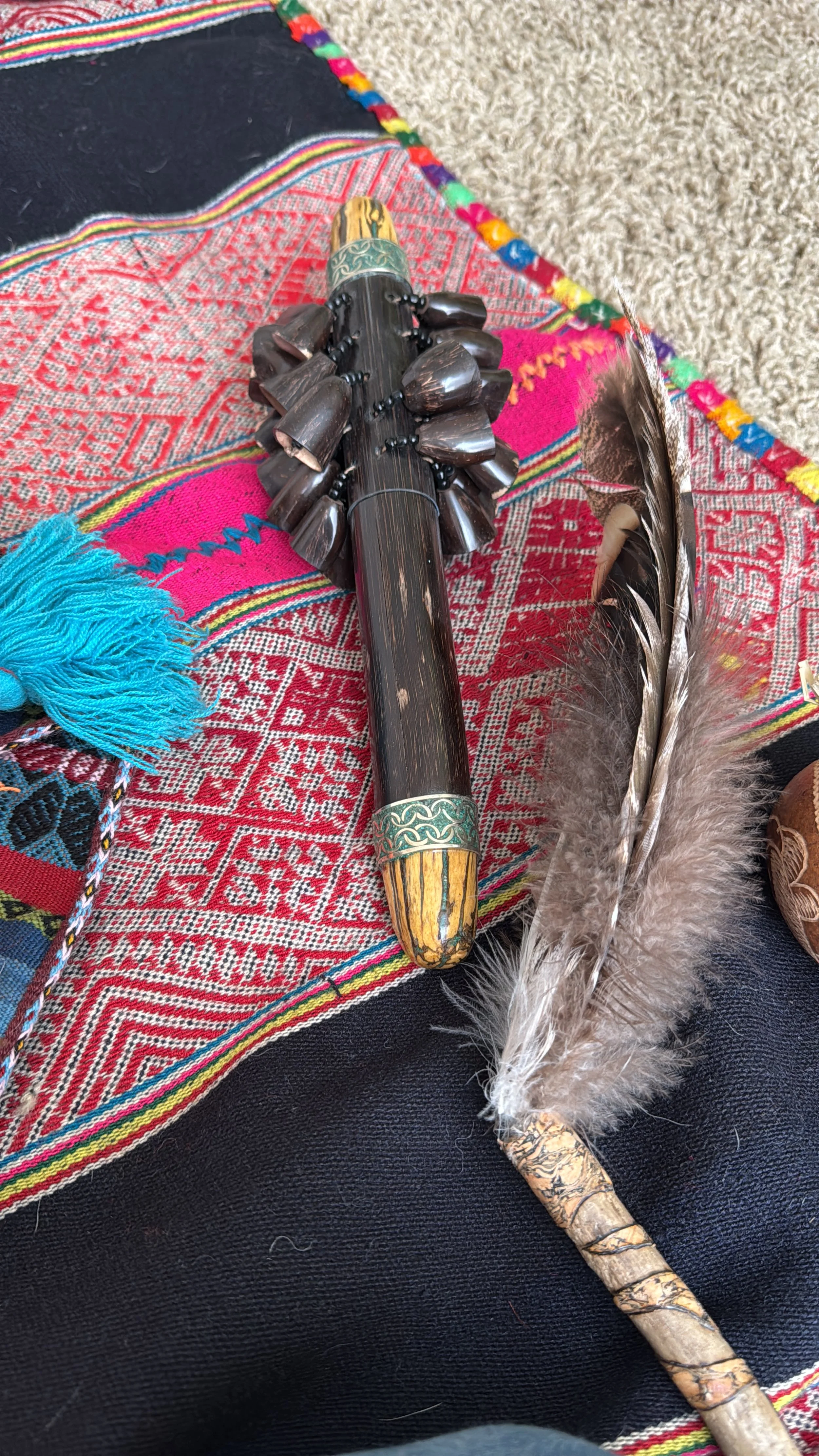 Shaman rattle and feather wand