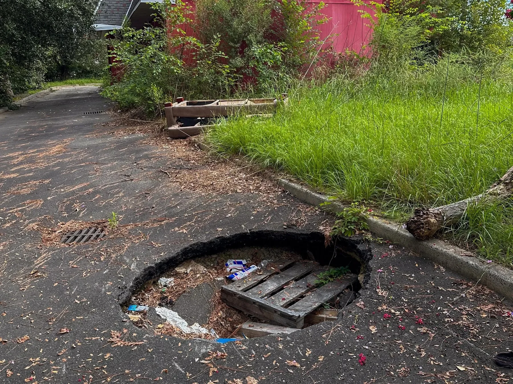 What Causes Potholes in My Driveway or Parking Lot?