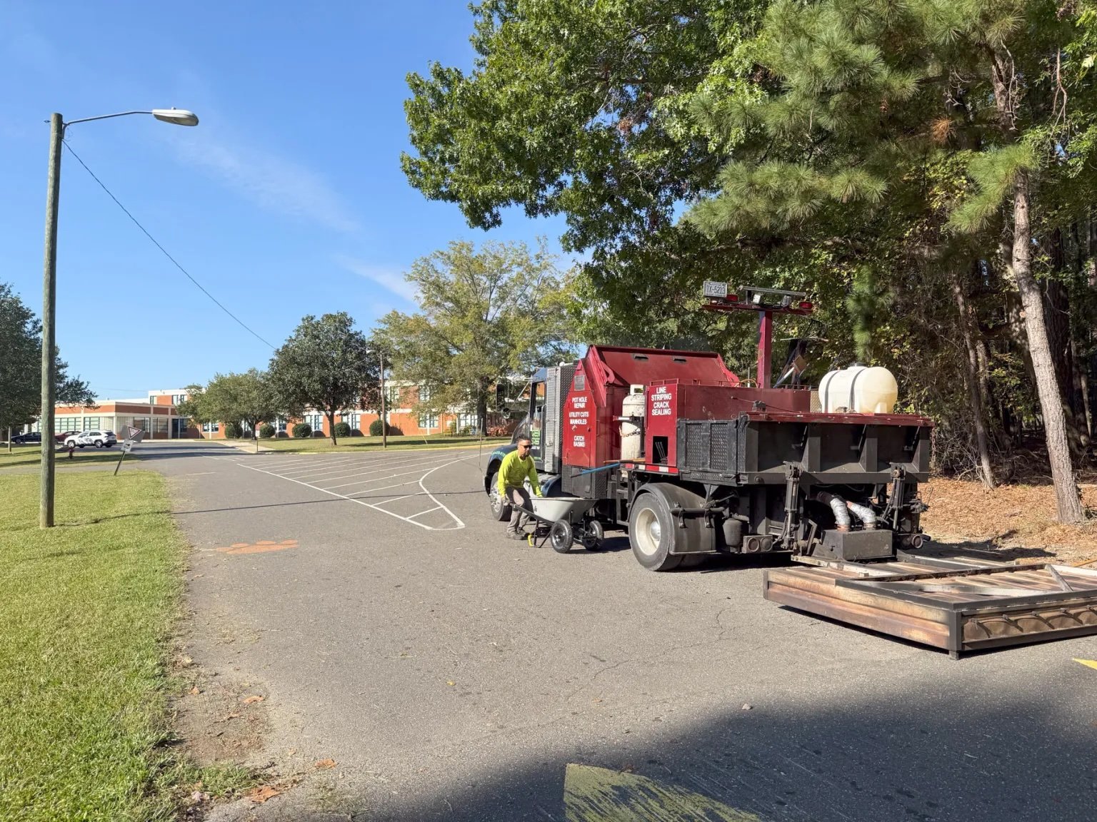 Infrared asphalt repair truck at Carrington Middle School, Durham NC