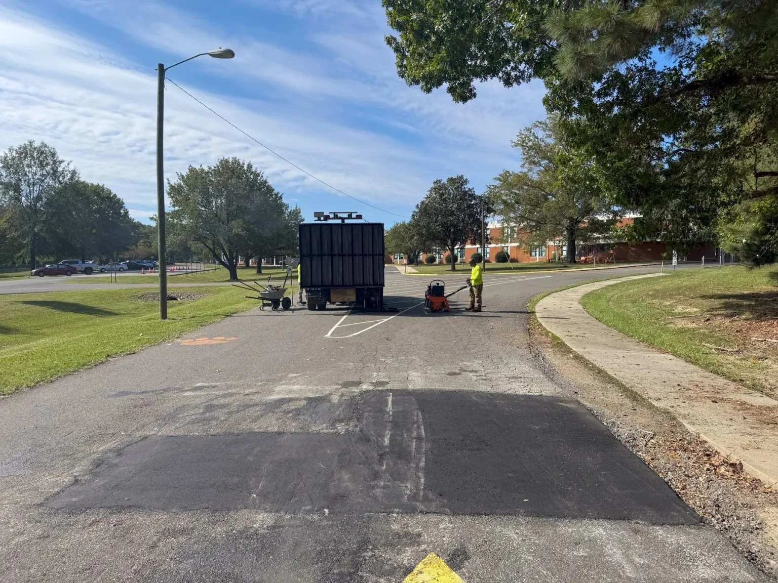 Finished infrared asphalt patch after pothole repair, Durham NC
